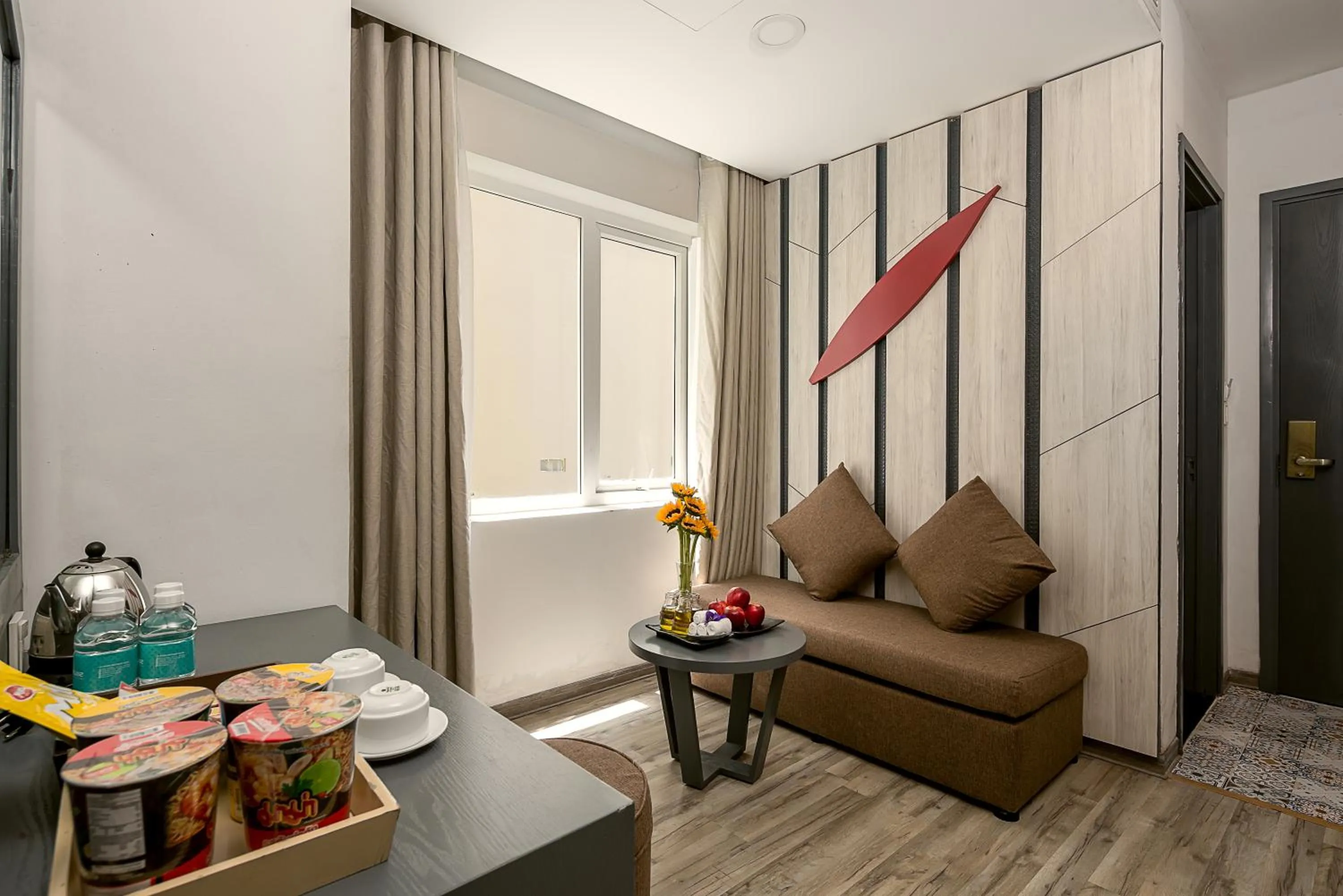 Seating area in Le House Boutique Hotel - 100m to the beach