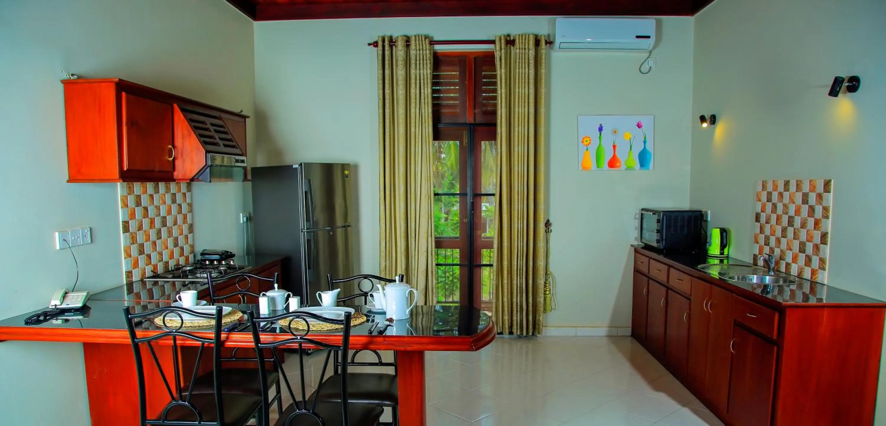 Kitchen or kitchenette in Christima Residence