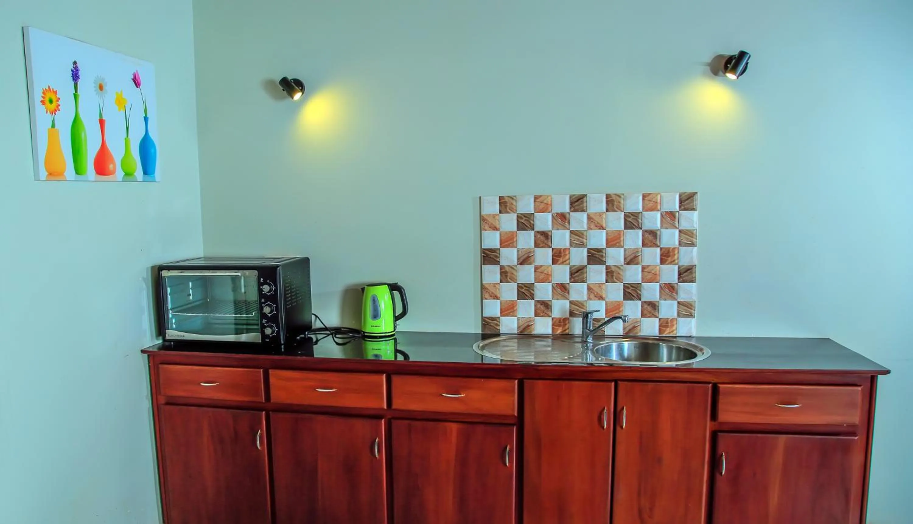 Kitchen or kitchenette in Christima Residence