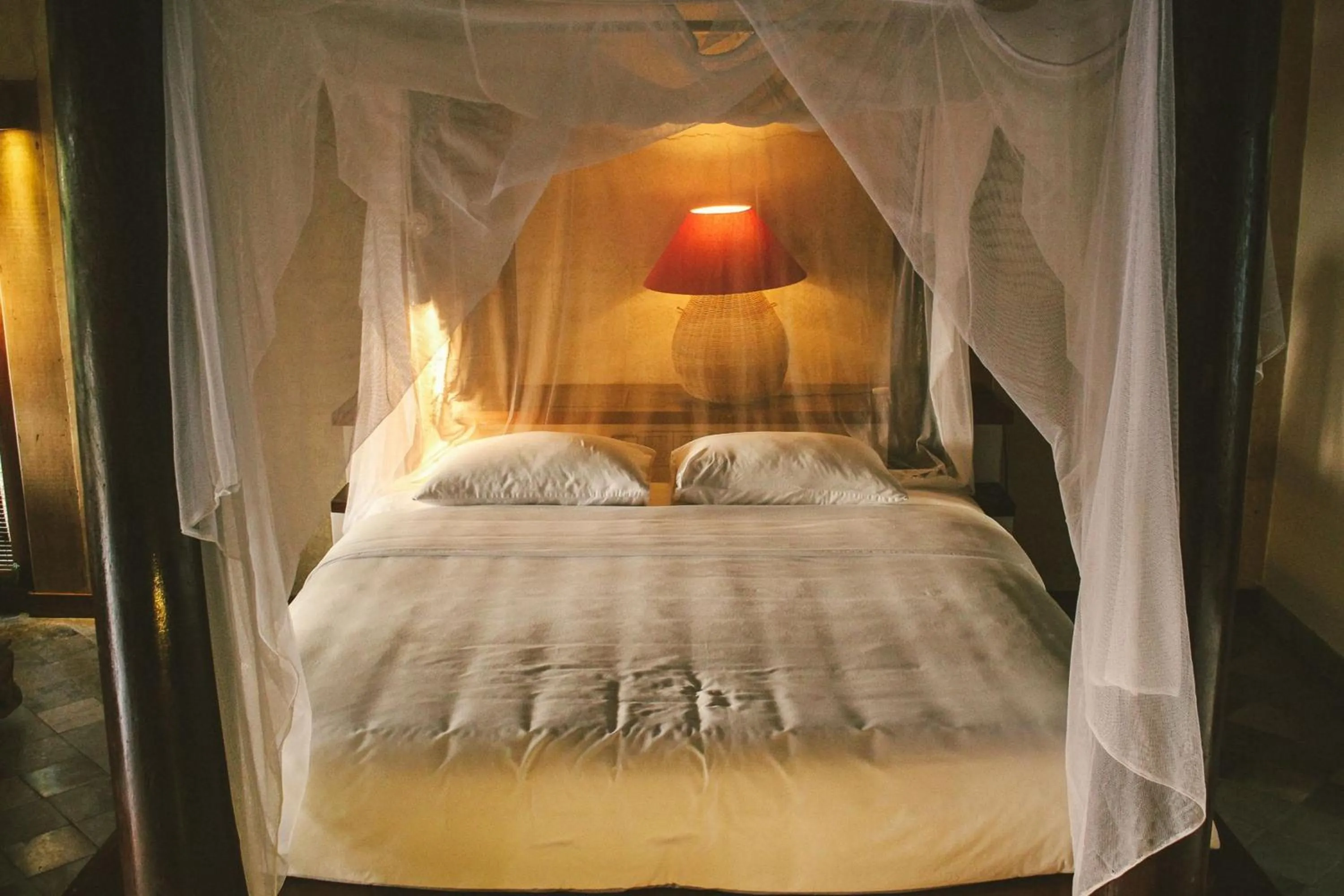 Bed in Villa Louise Hue Beach Boutique Hotel