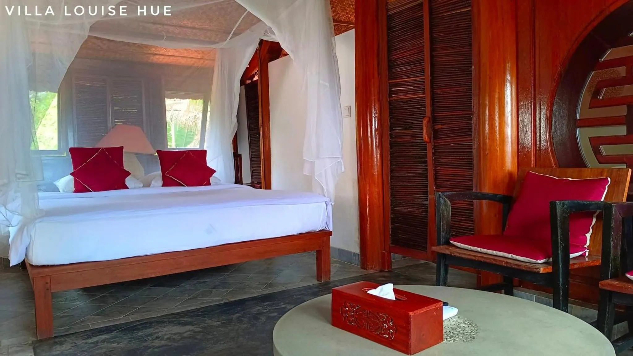 Bed in Villa Louise Hue Beach Boutique Hotel