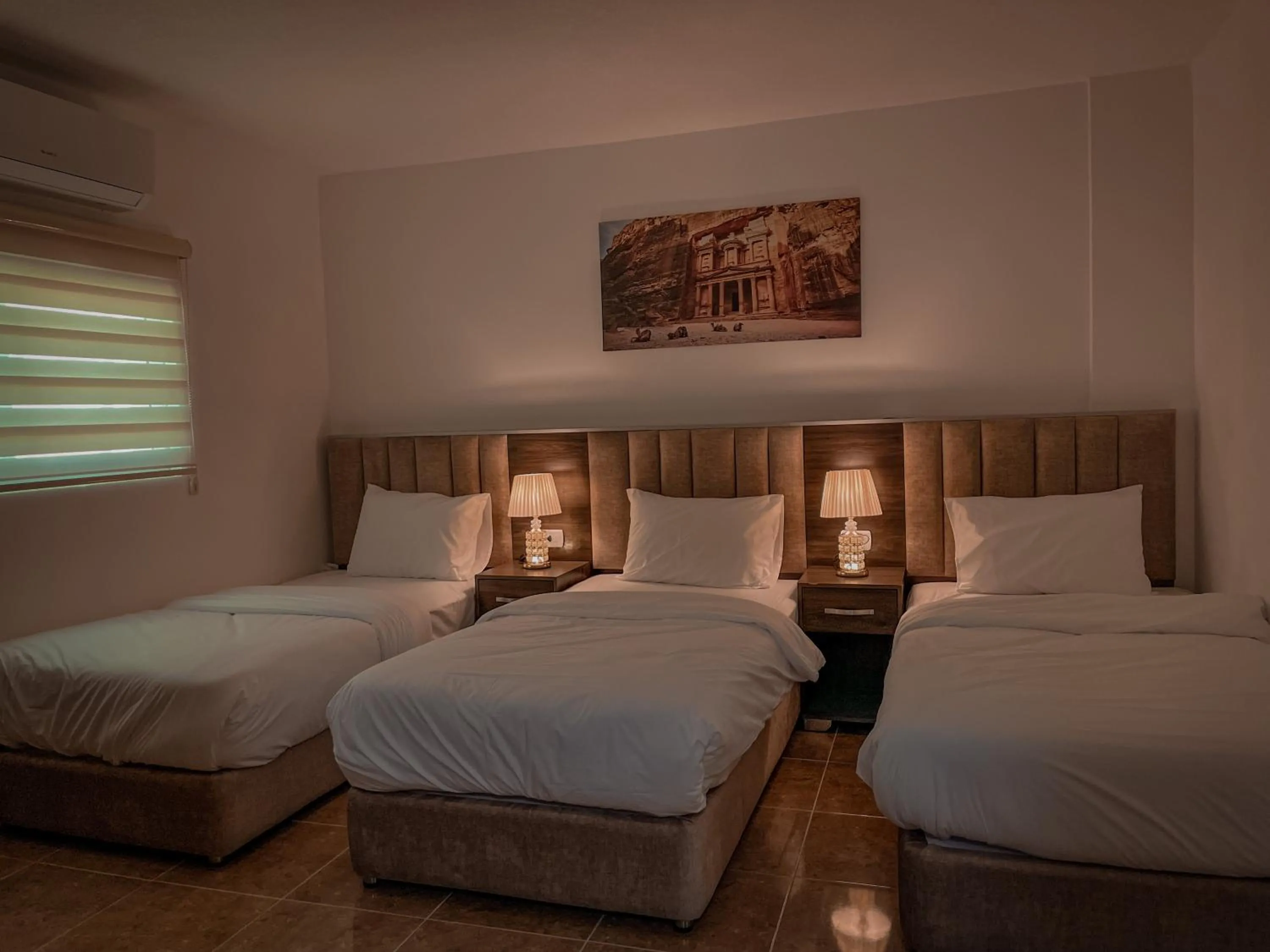Bed in Petra Jewel Hotel
