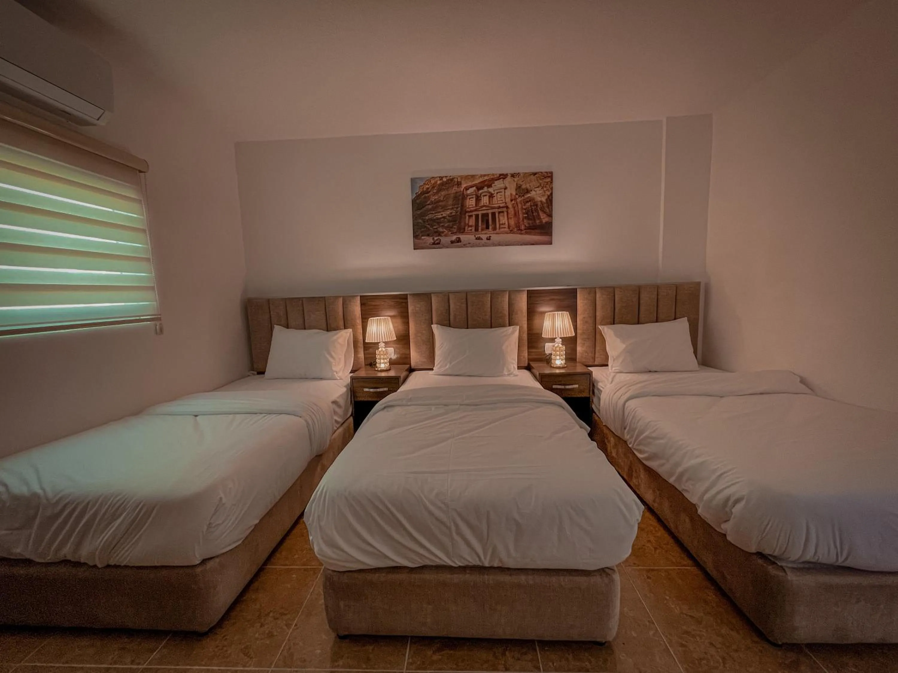 Bed in Petra Jewel Hotel