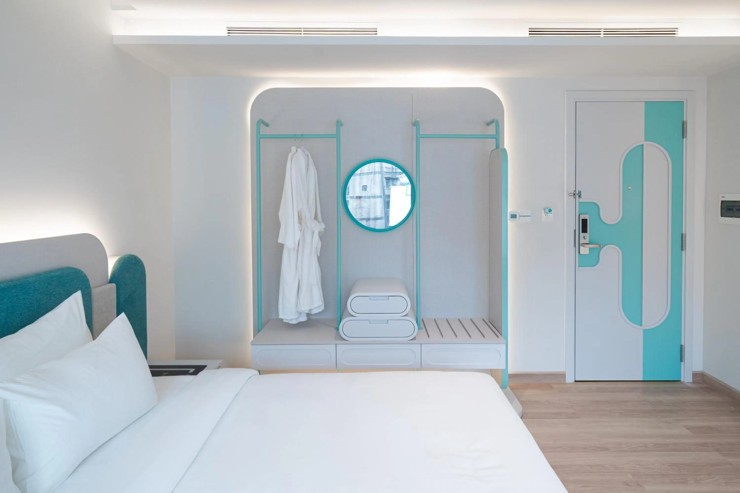 Bedroom, Bed in IconSphere Hotel