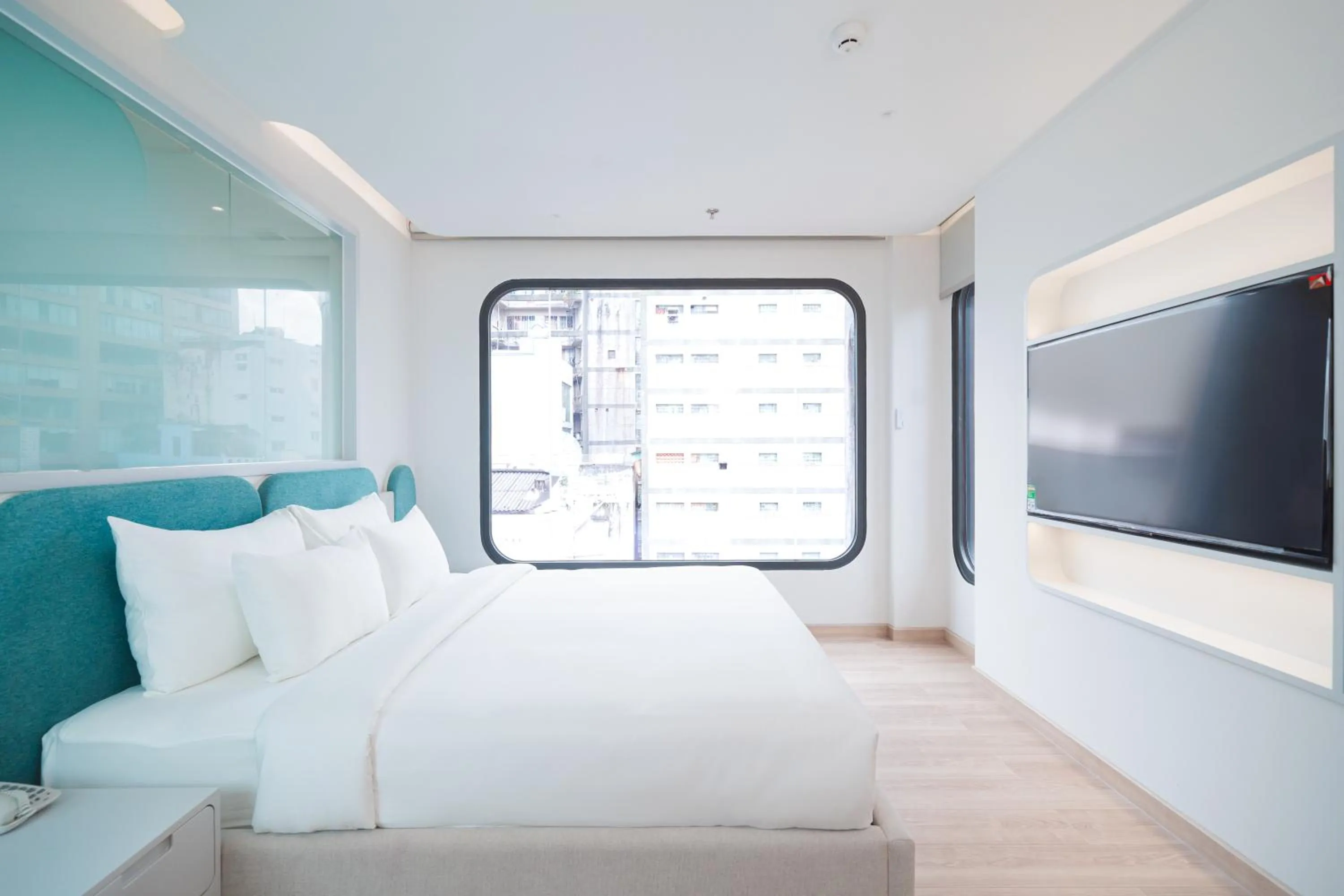 Bedroom, Bed in IconSphere Hotel