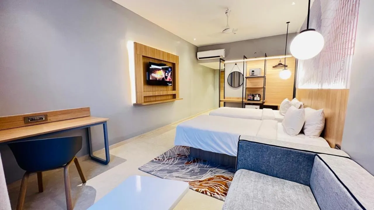 Bed in Hotel Manorama Vijayawada