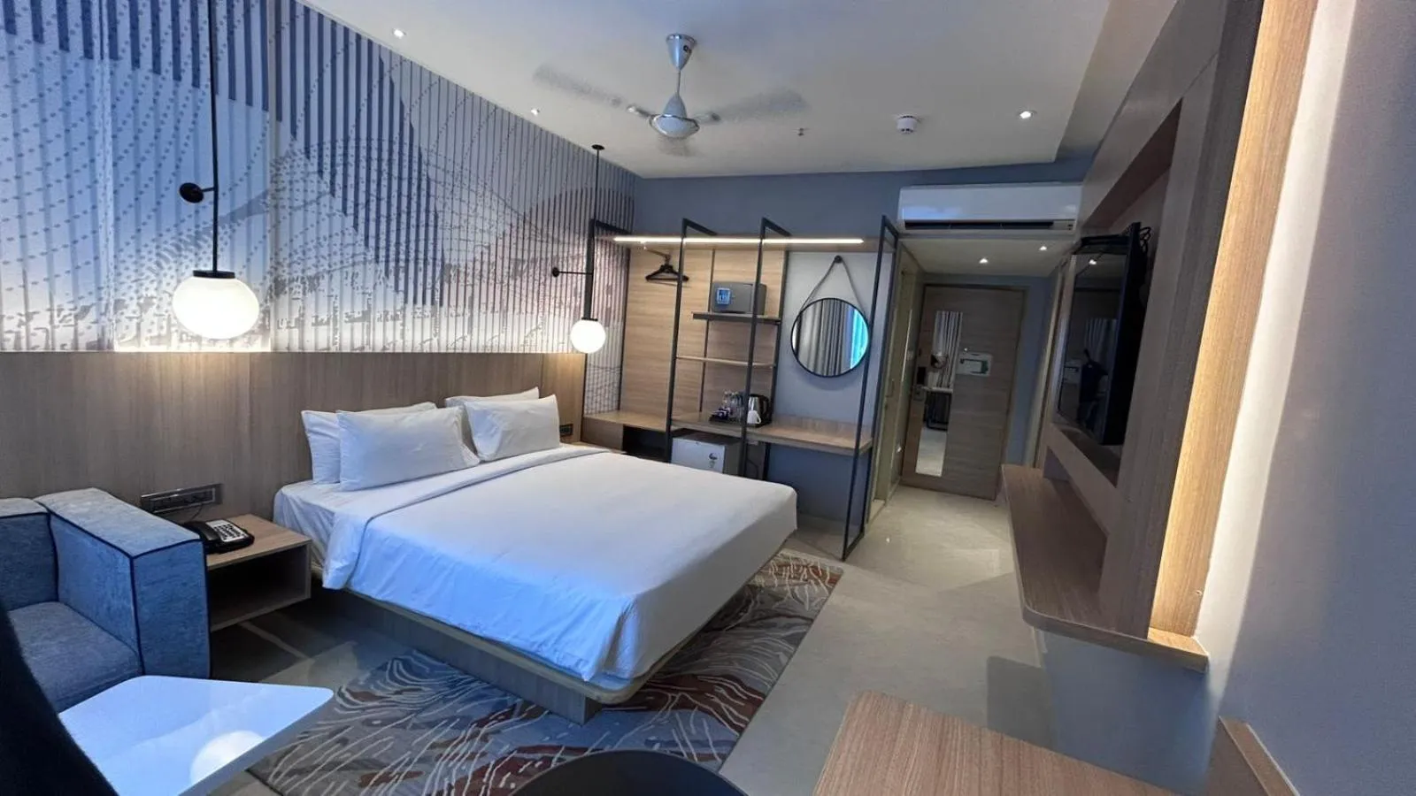 Bed in Hotel Manorama Vijayawada