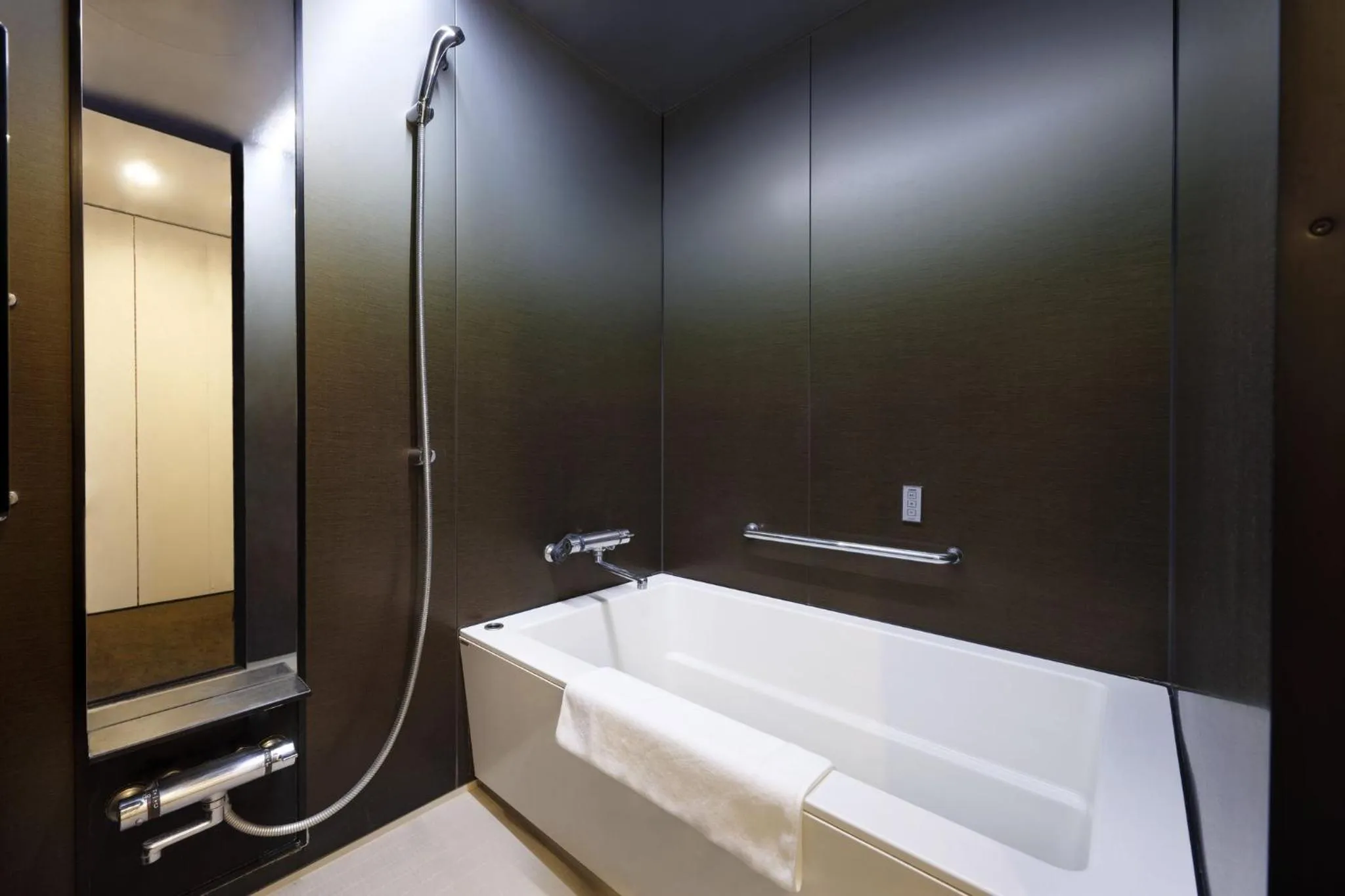Bathroom in Holiday Inn & Suites Sapporo Odori Park by IHG