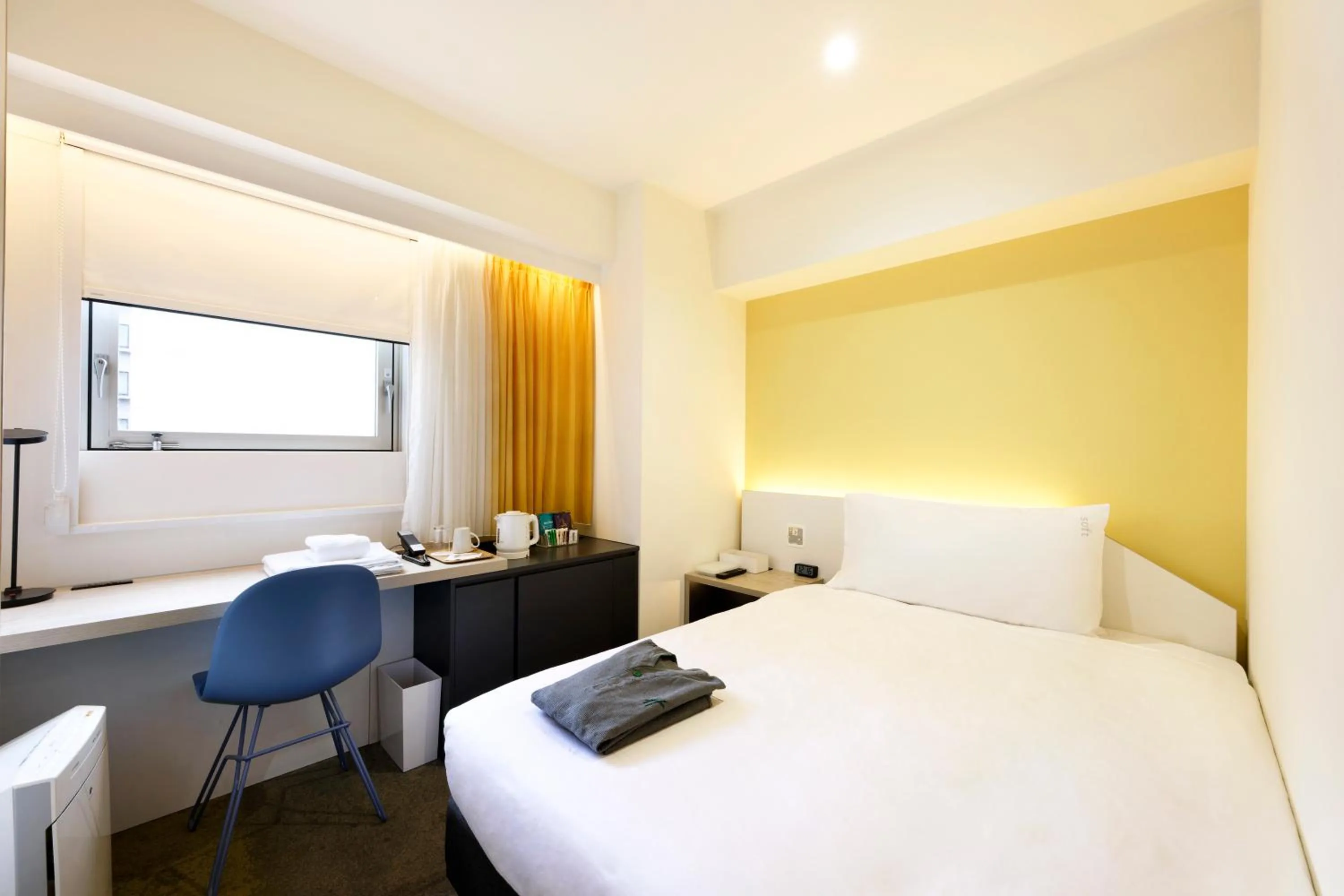 Photo of the whole room, Bed in Holiday Inn & Suites Sapporo Odori Park by IHG