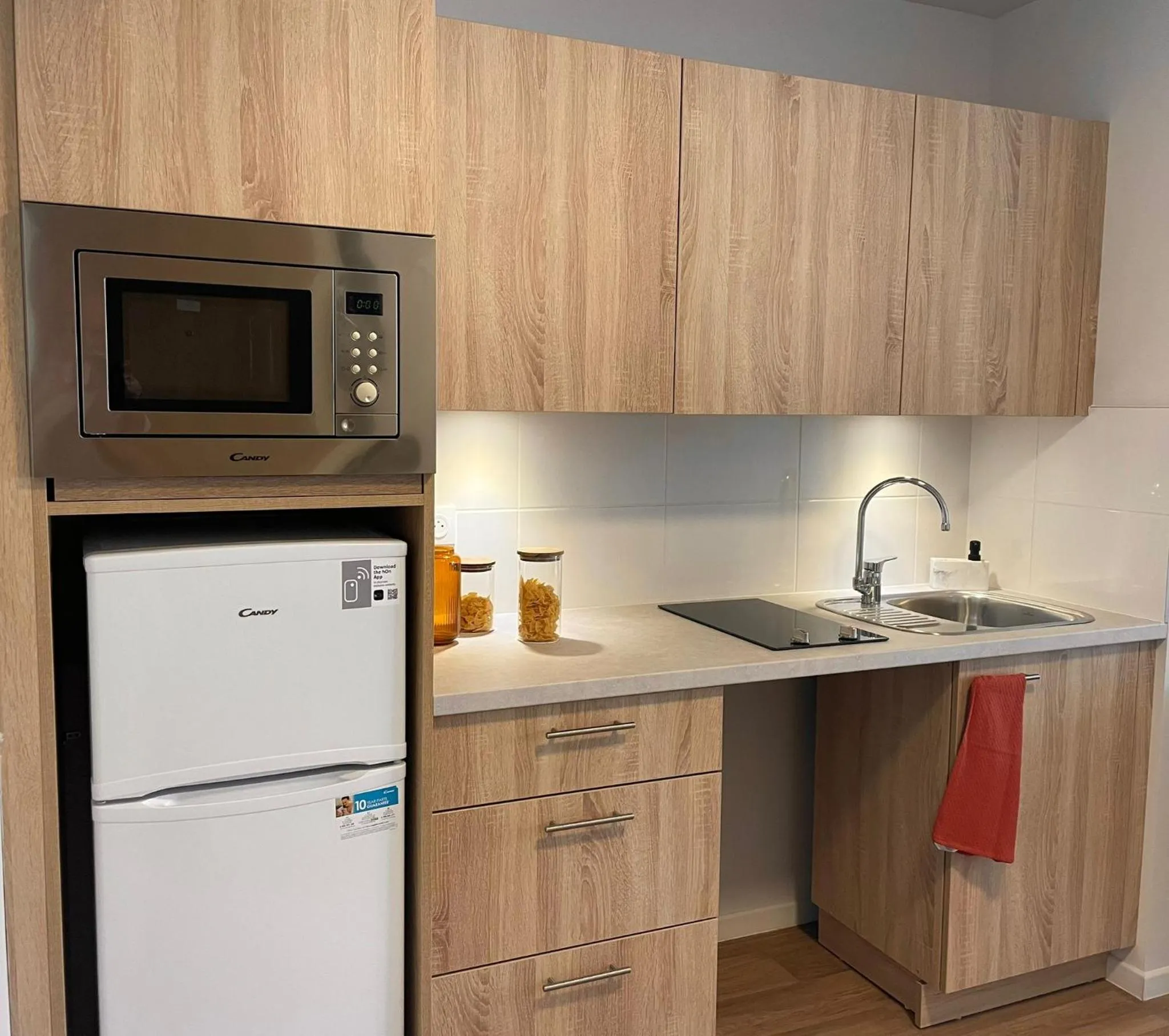 Kitchen or kitchenette in Zenao Appart'hôtels Châlons-en-Champagne