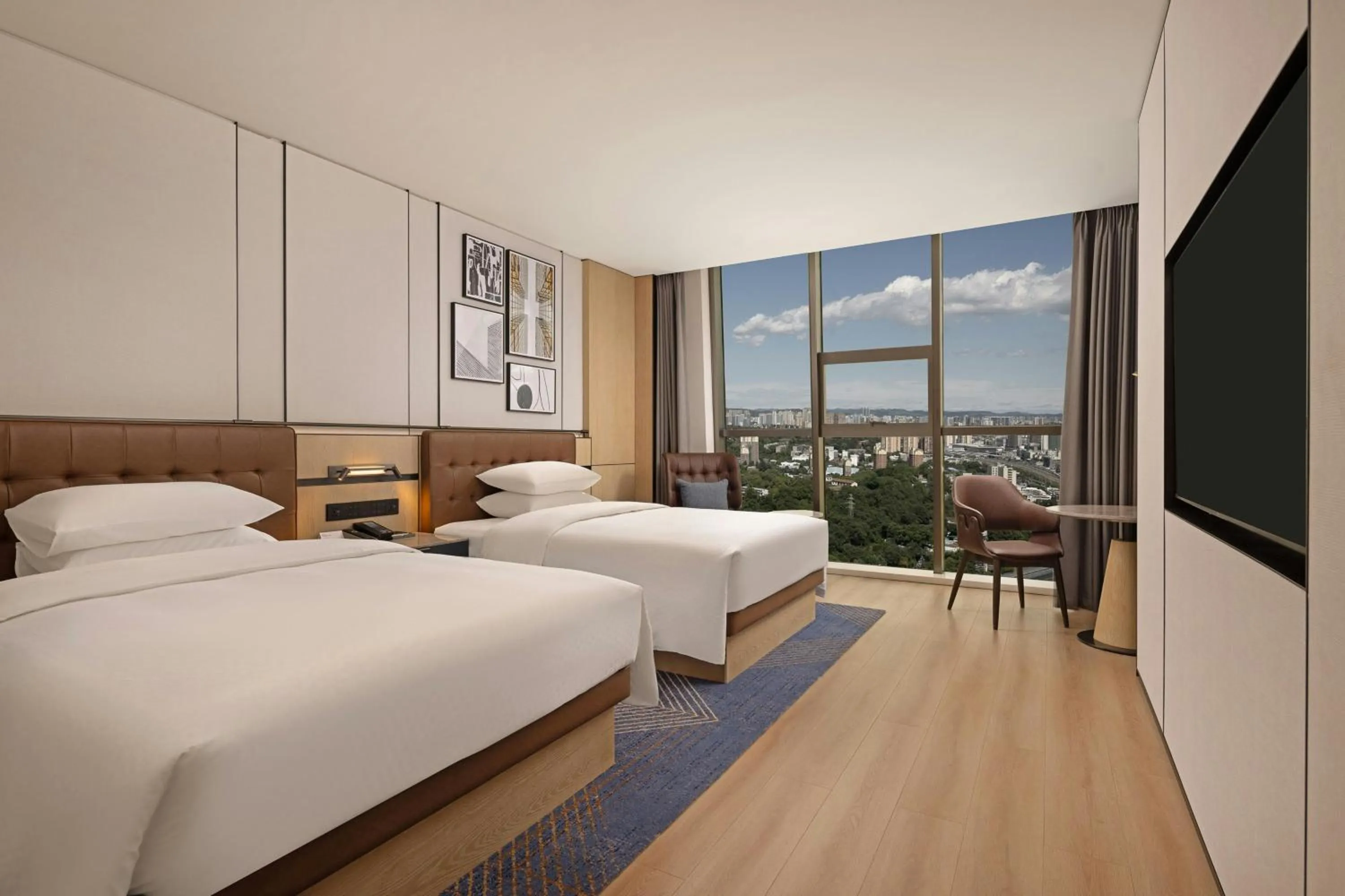 Photo of the whole room, Bed in Four Points by Sheraton Mianyang