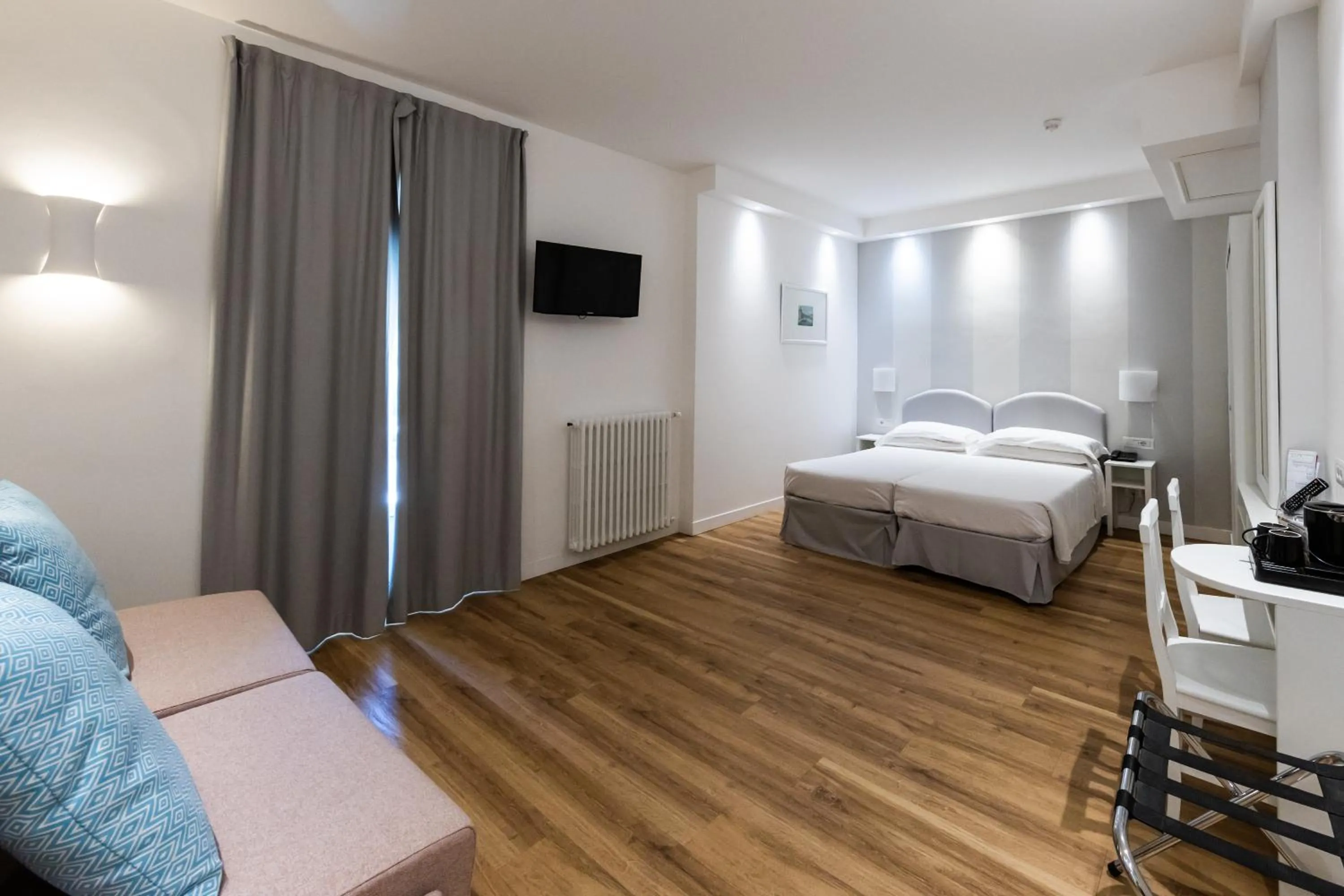 Bed in Hotel Beau Rivage