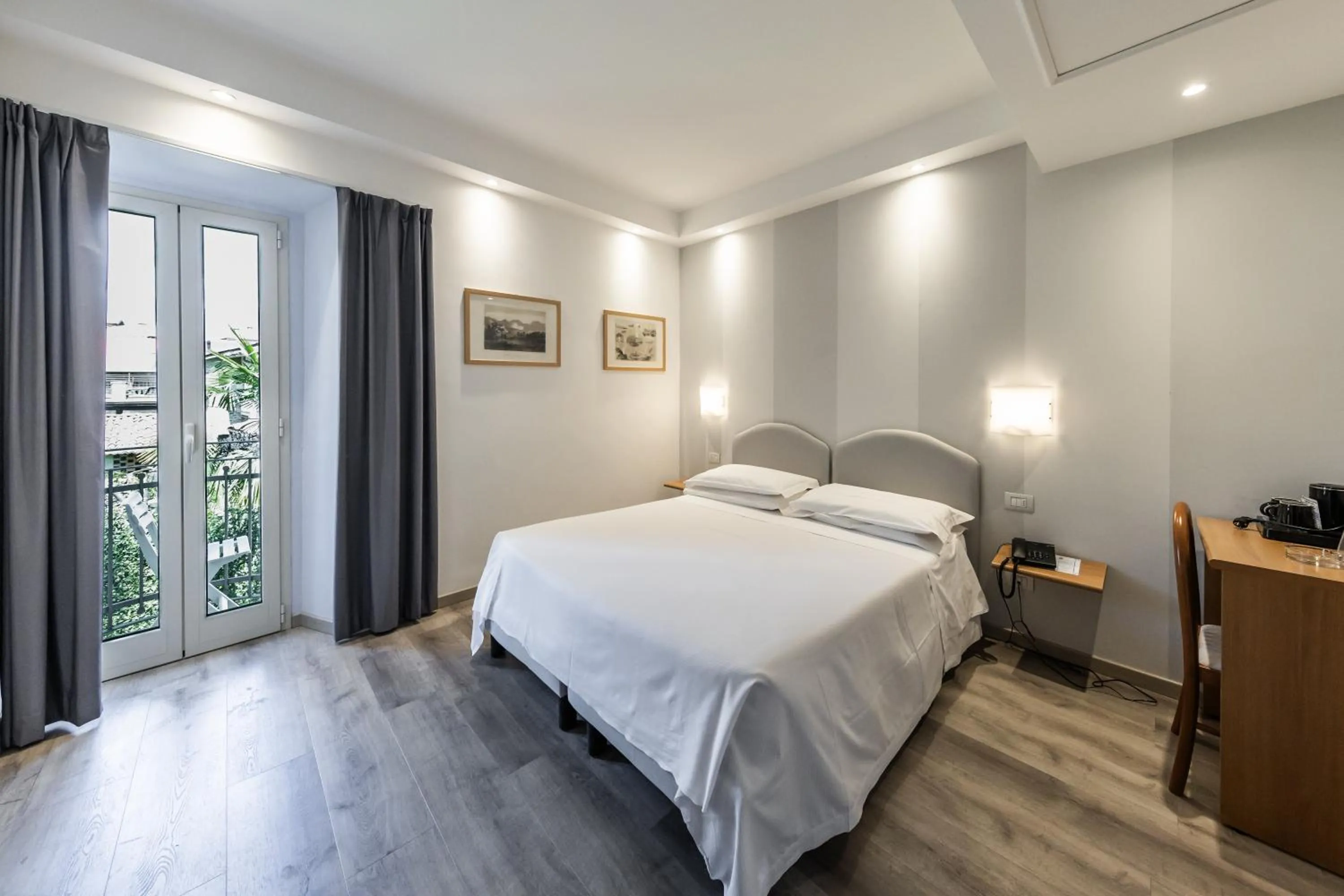 Bed in Hotel Beau Rivage