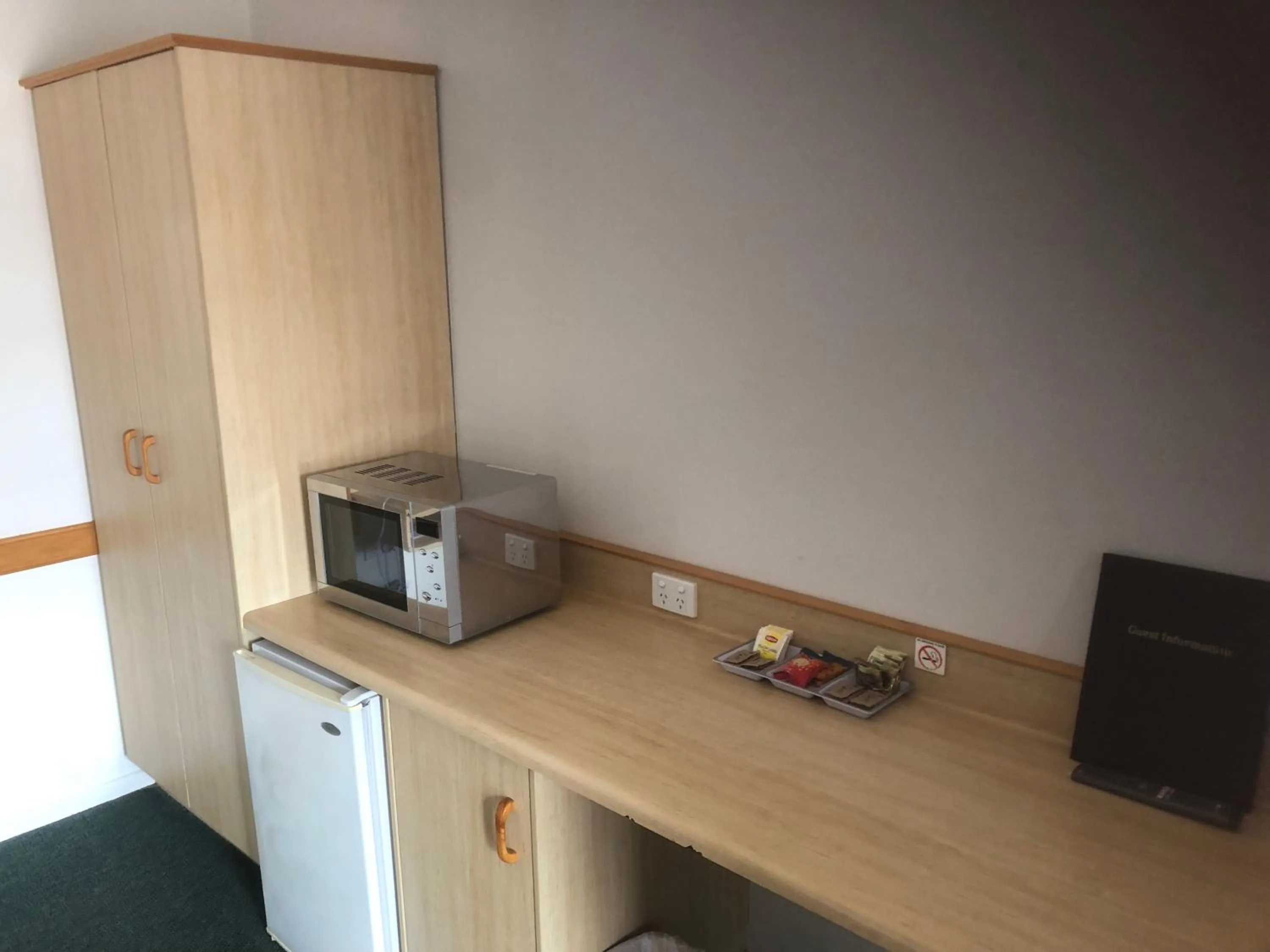 minibar in Warwick Vines Motel