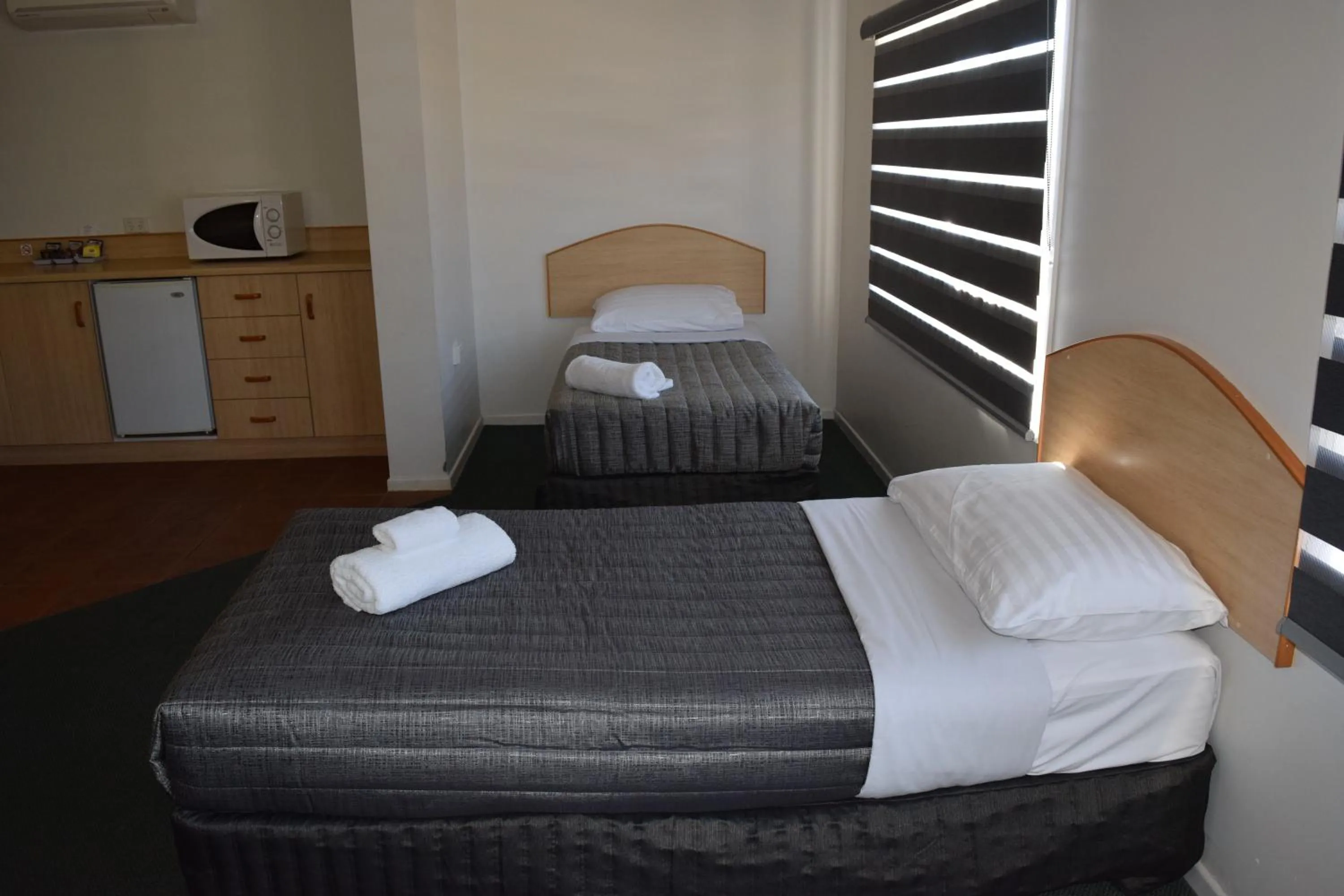 Bed in Warwick Vines Motel