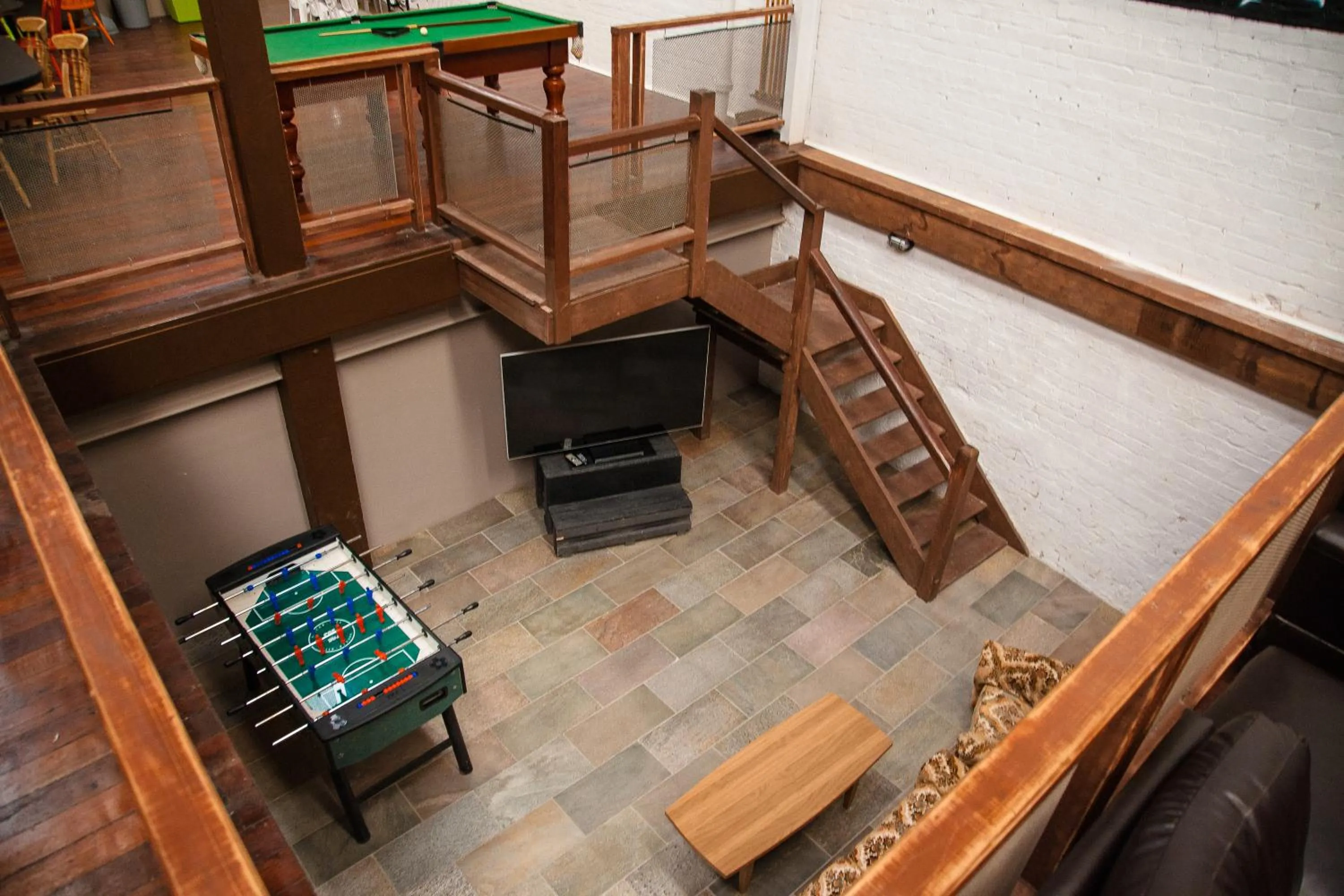 Communal lounge/ TV room in Fremantle Hostel