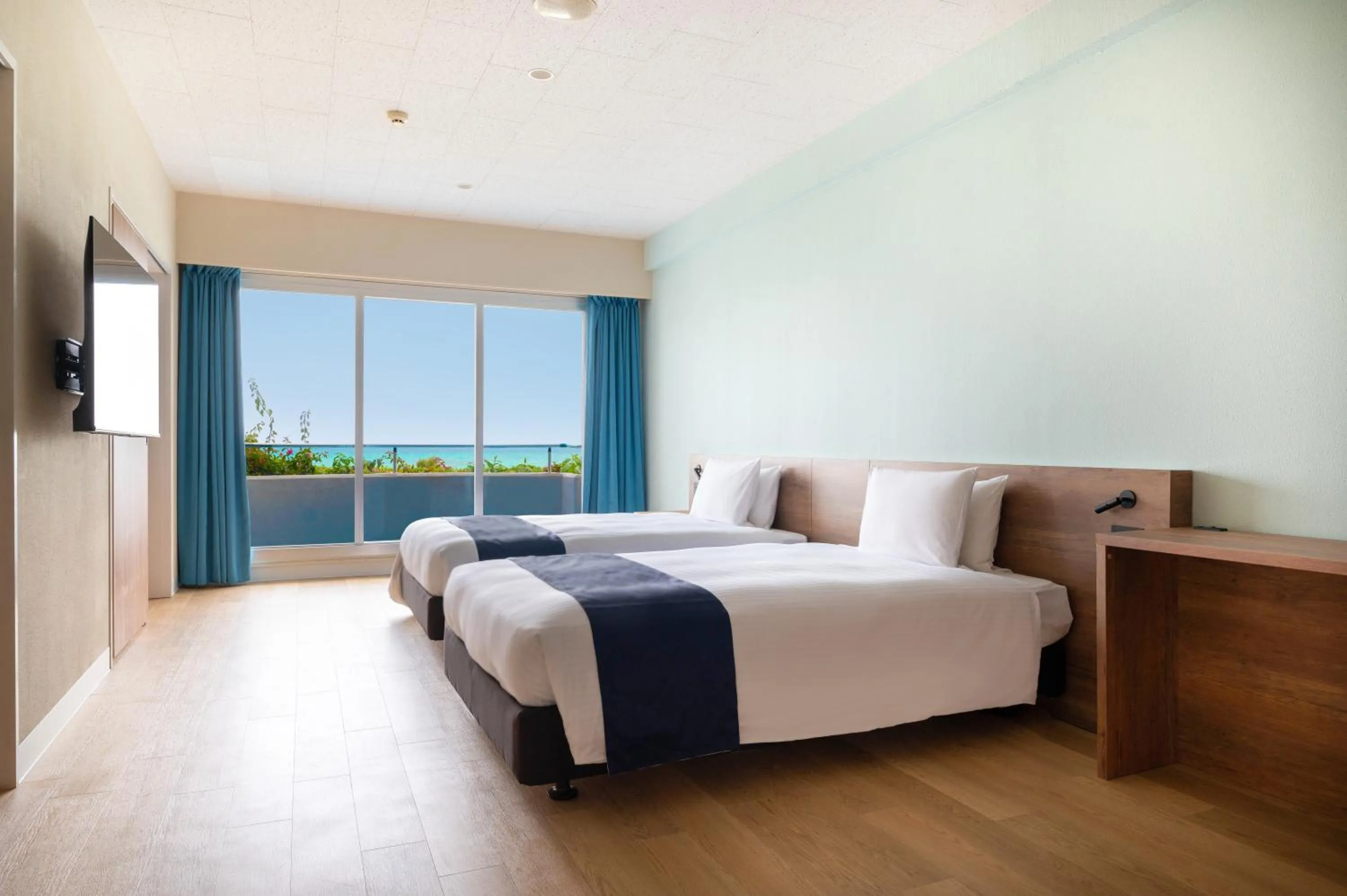 View (from property/room), Bed in EN RESORT Kumejima EEF Beach Hotel