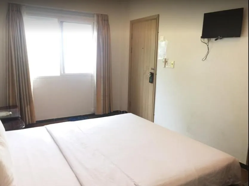 Bed in Sunshine Bungalow