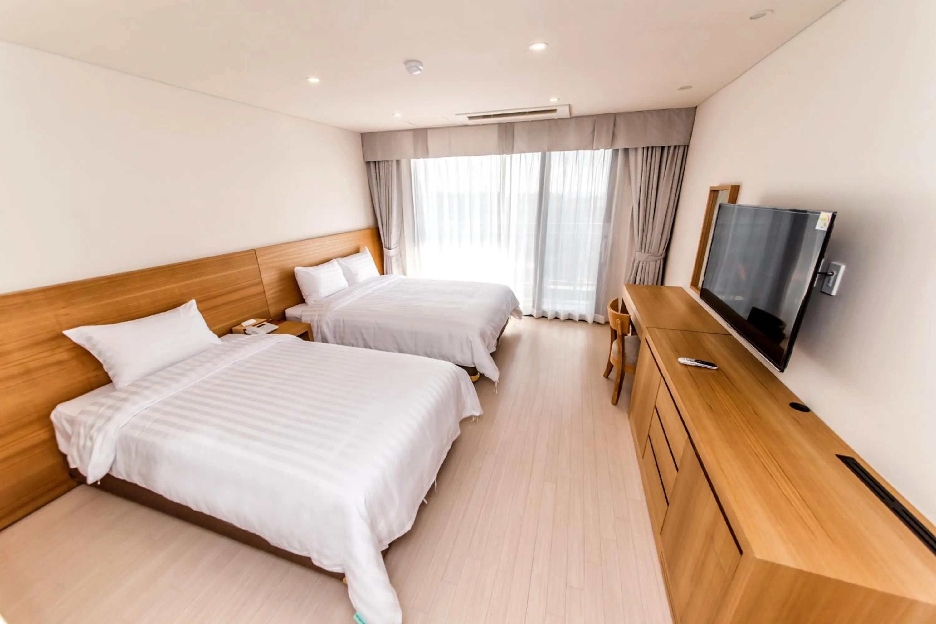 Bed in BK Hotel Jeju