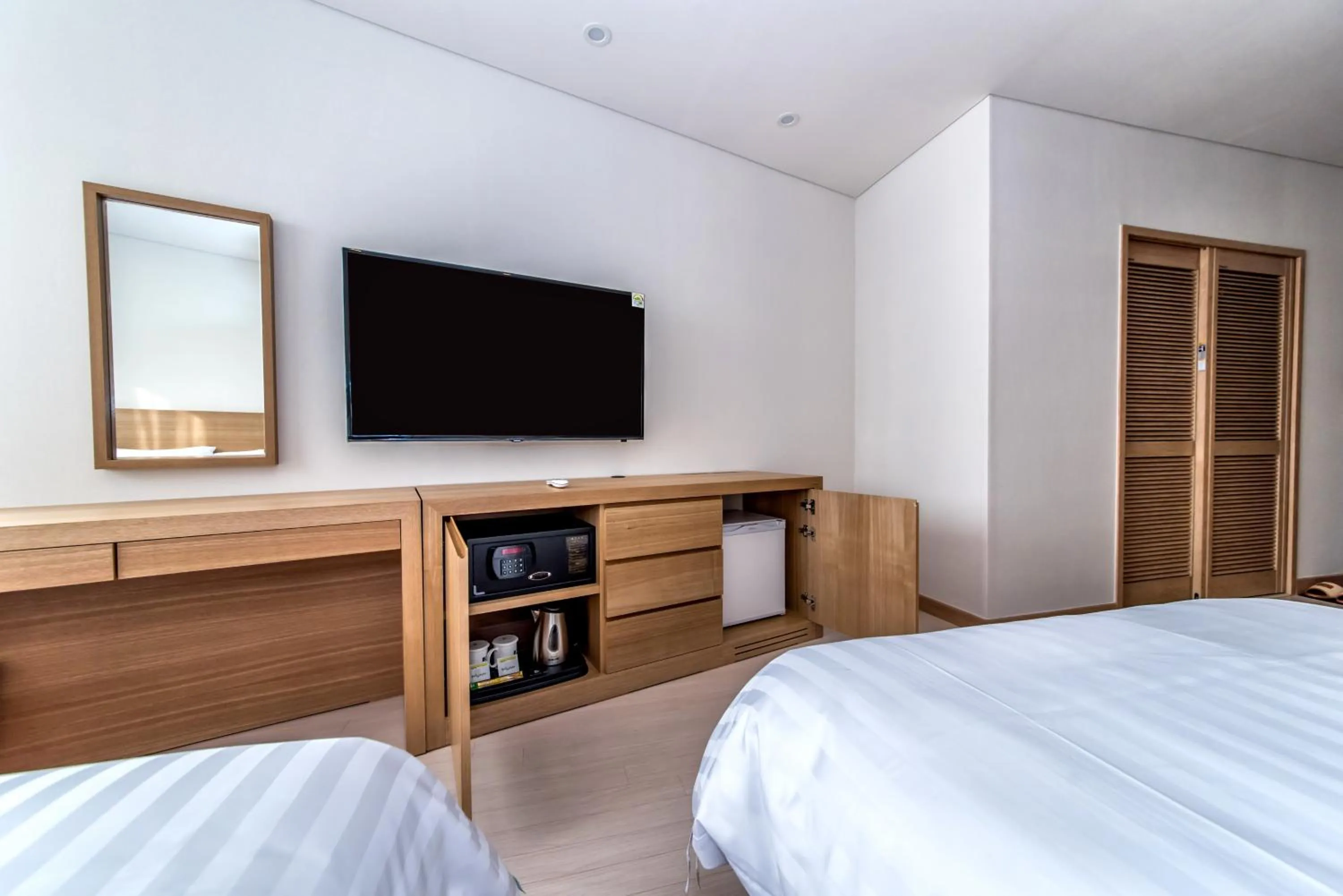 Photo of the whole room, Bed in BK Hotel Jeju