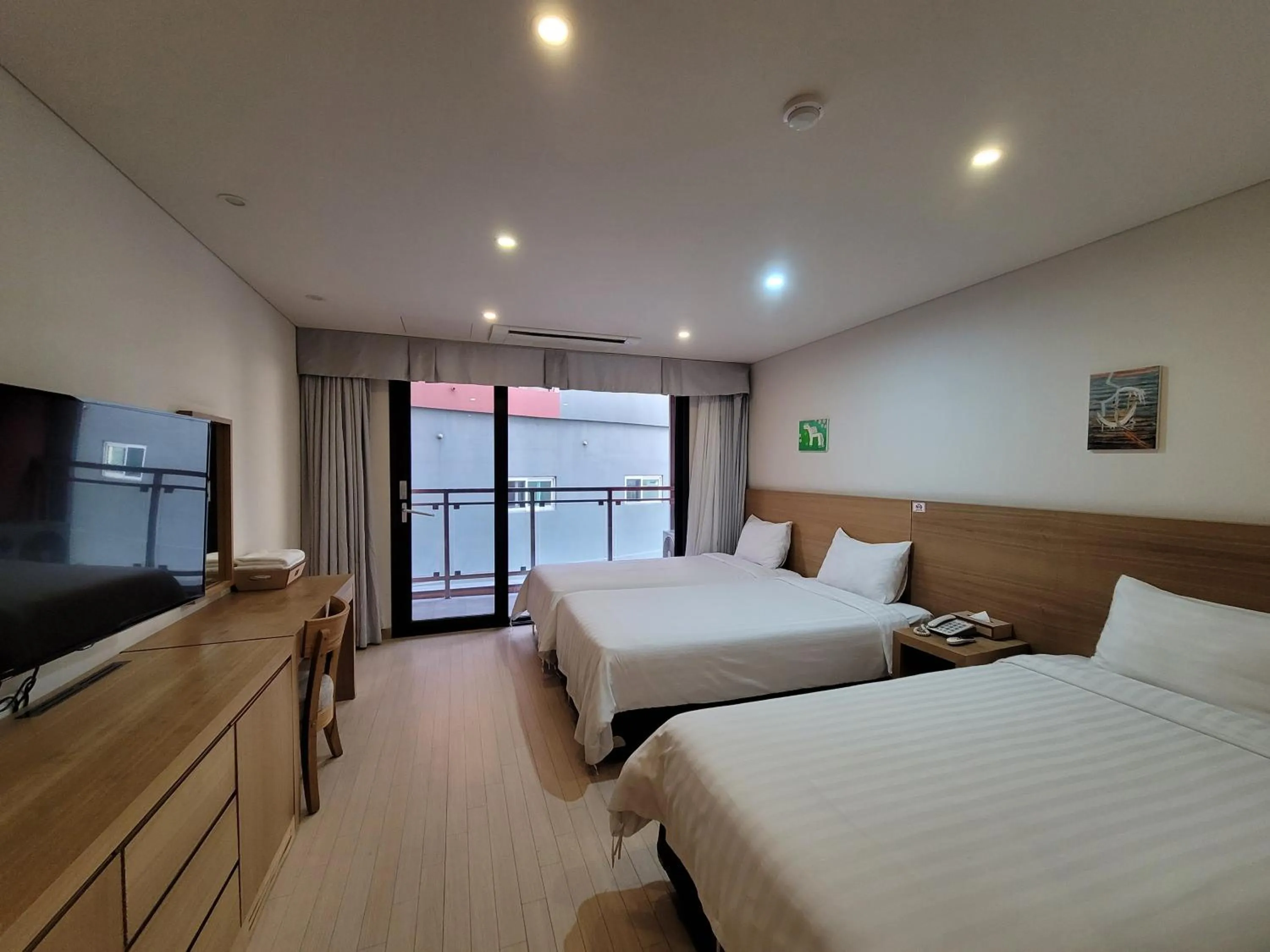 Photo of the whole room, Bed in BK Hotel Jeju