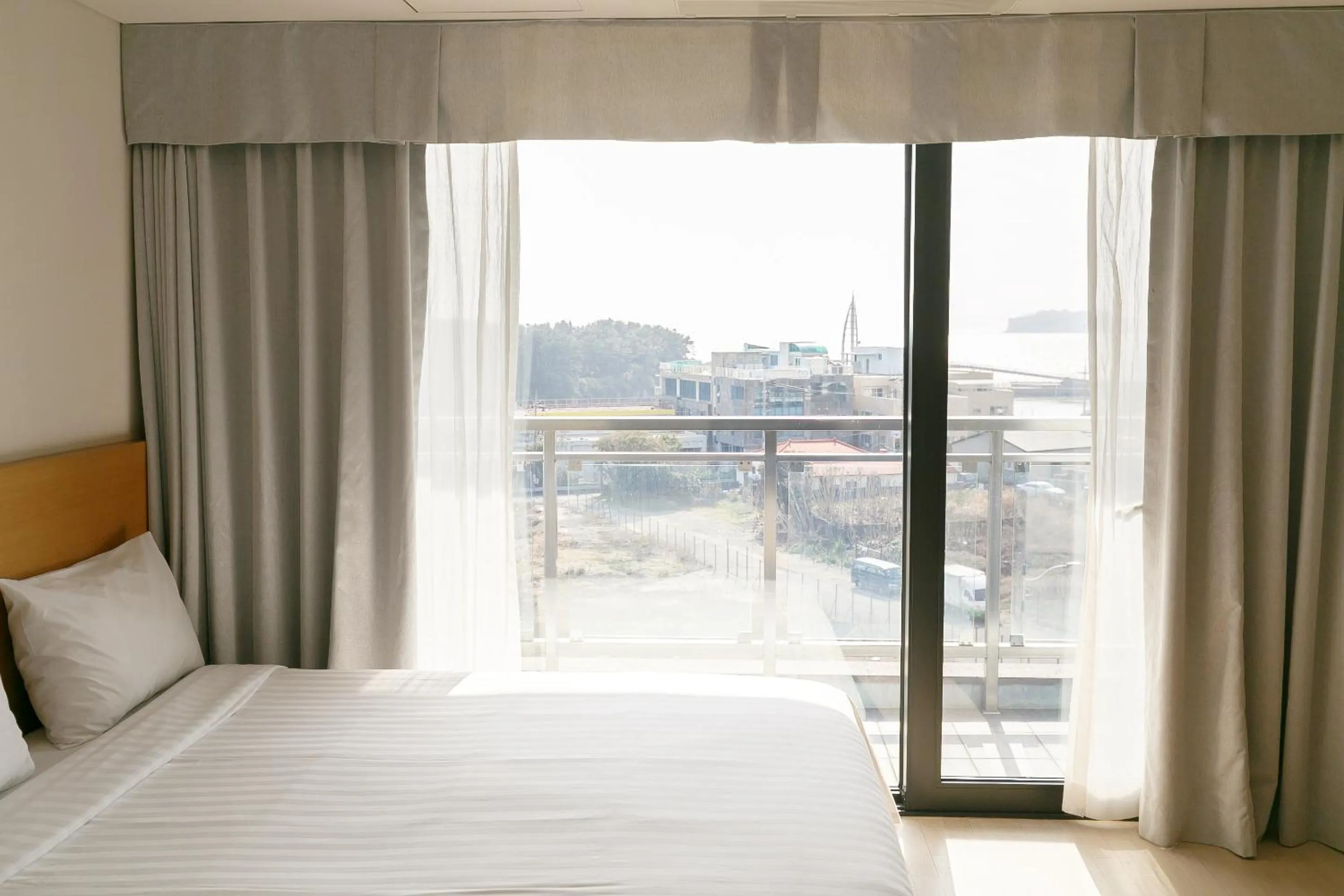 View (from property/room), Bed in BK Hotel Jeju
