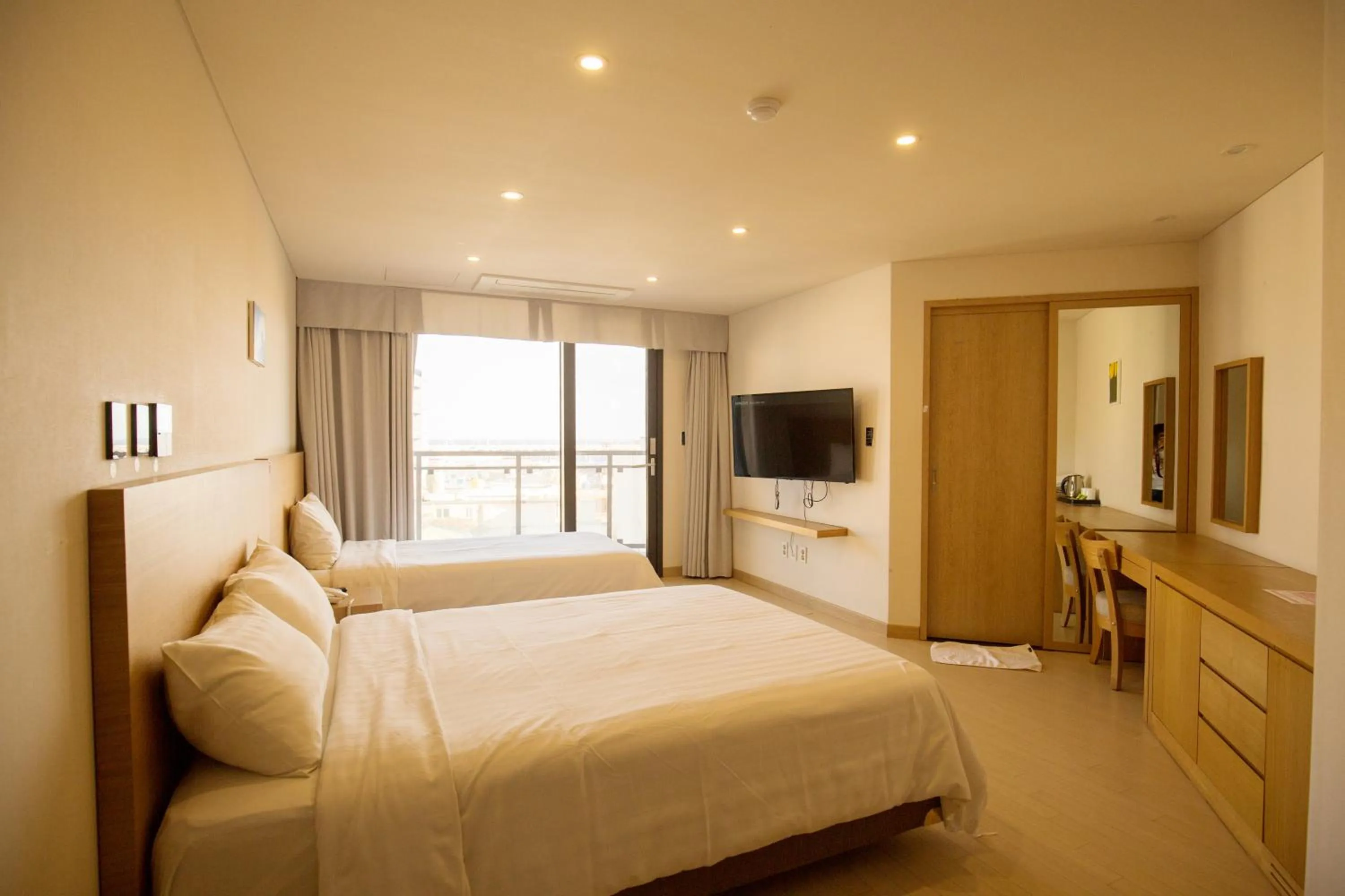 Photo of the whole room, Bed in BK Hotel Jeju