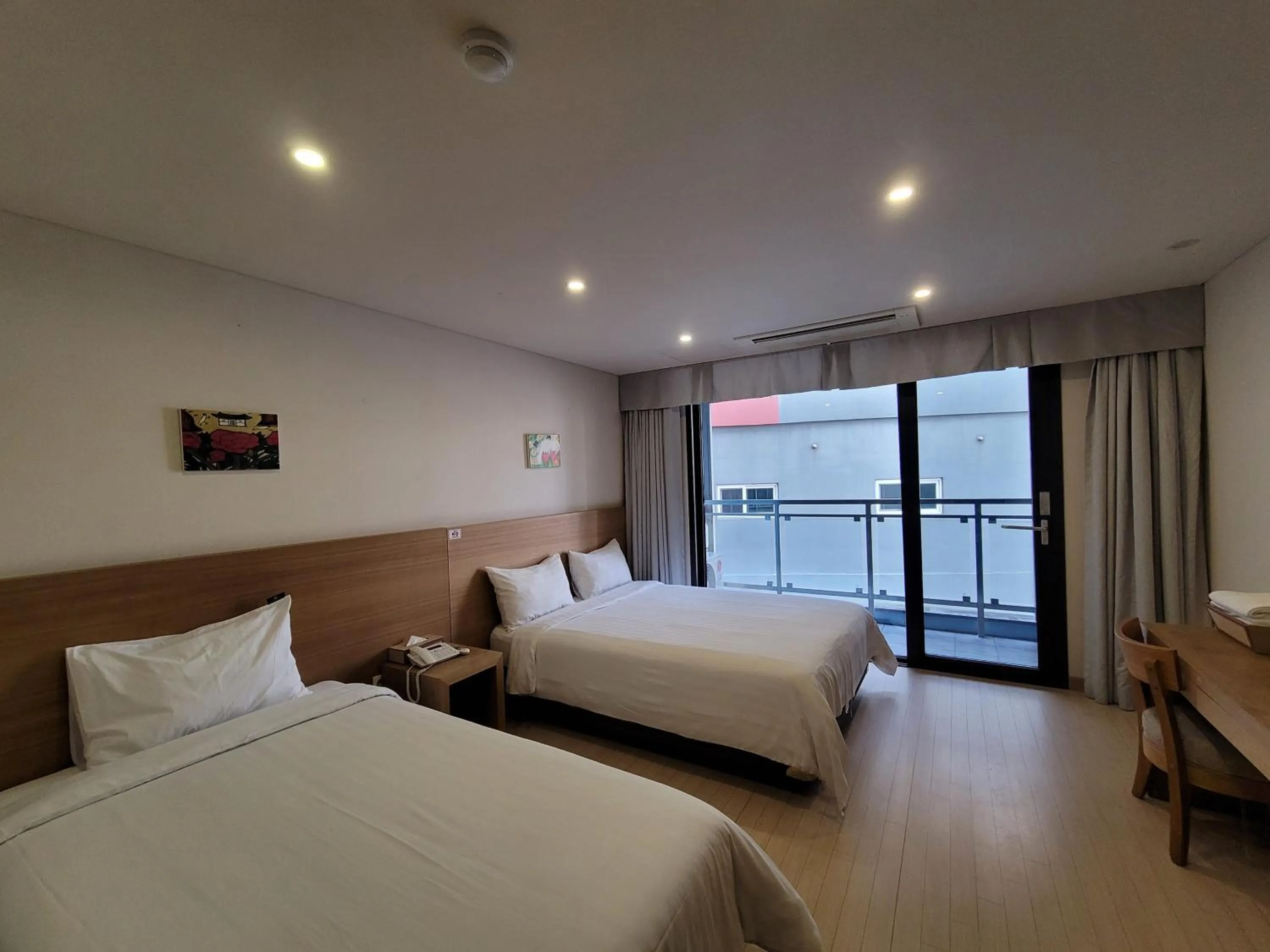 Photo of the whole room, Bed in BK Hotel Jeju
