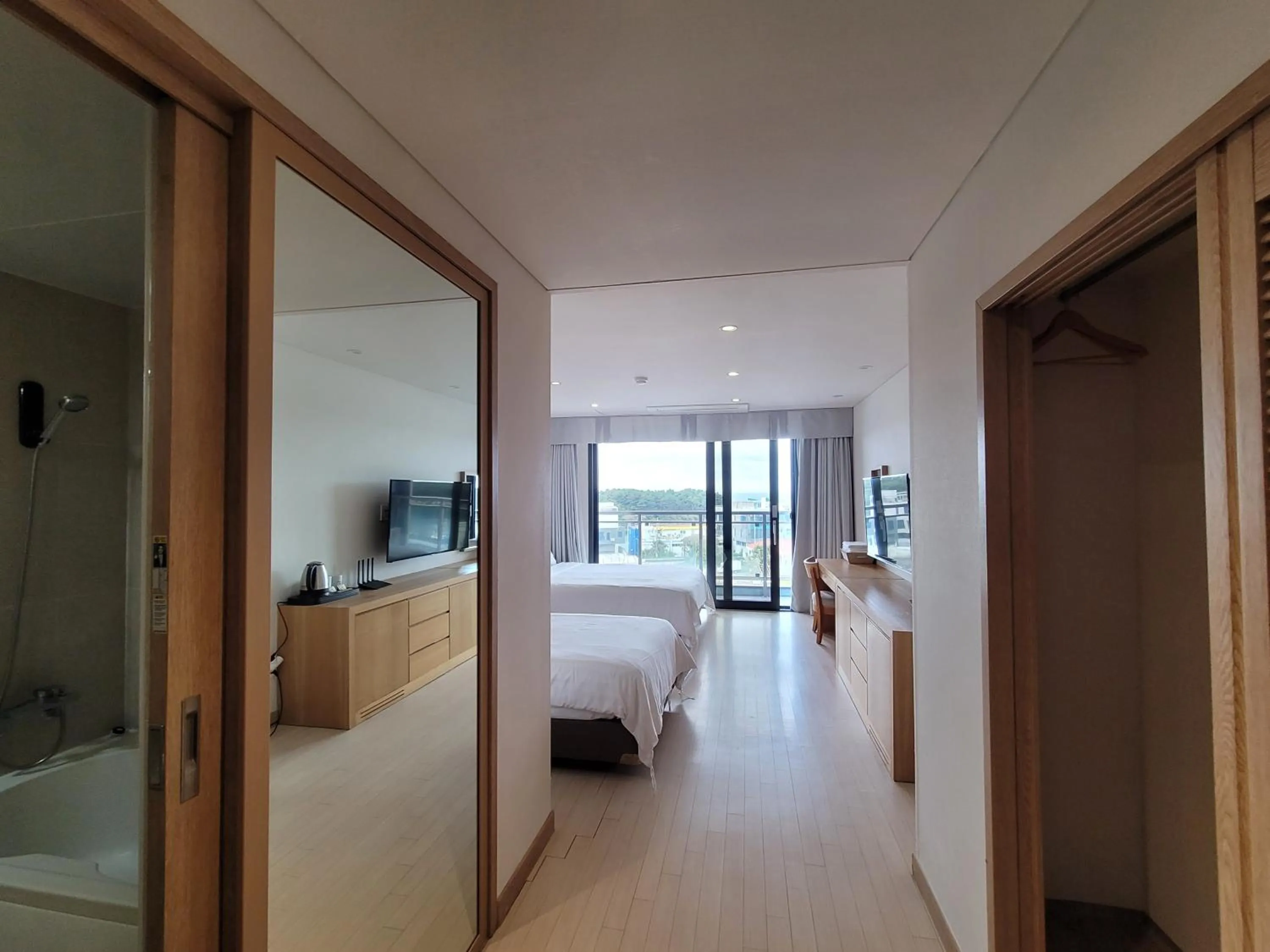Photo of the whole room, Bed in BK Hotel Jeju
