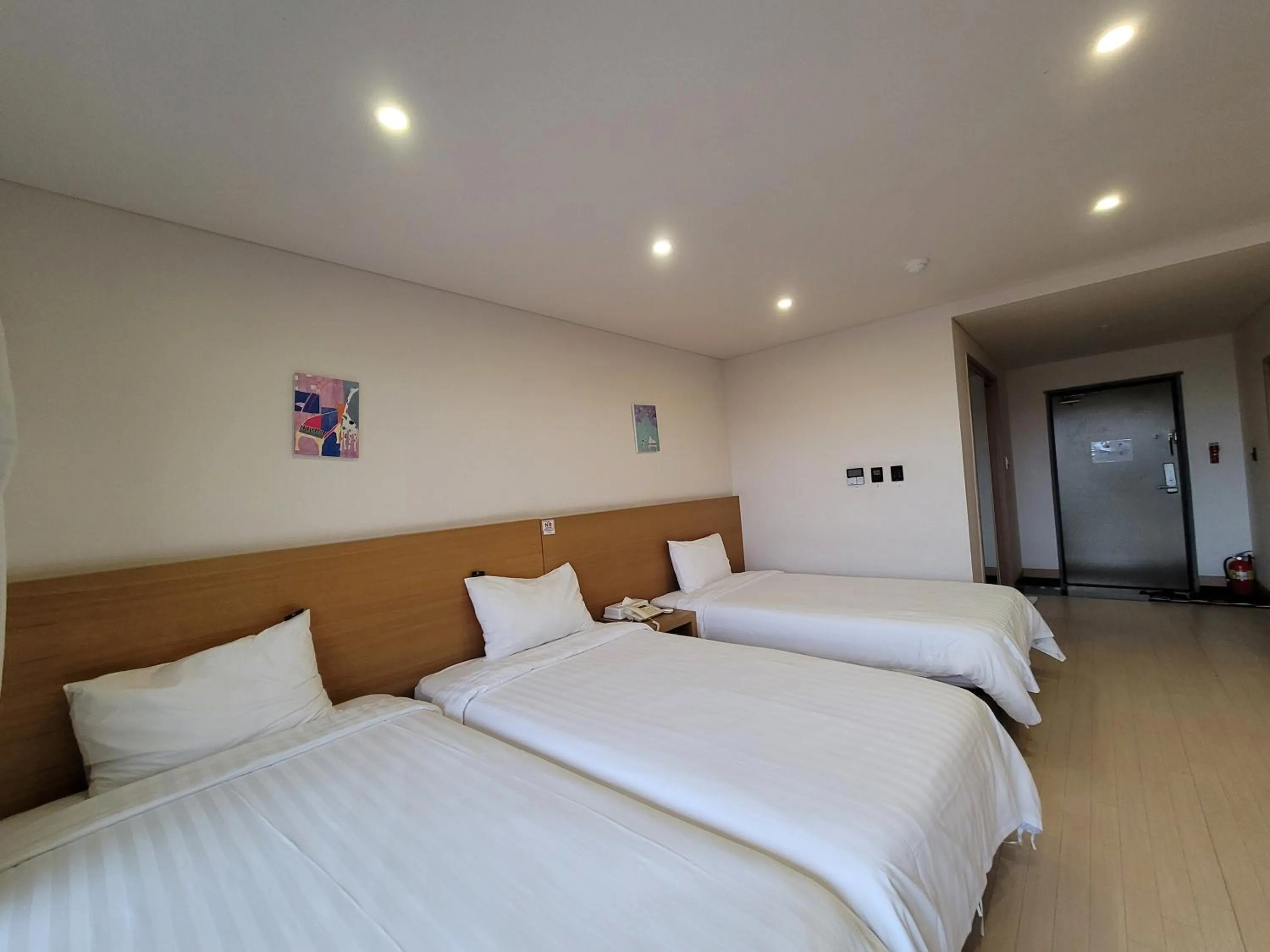 Bed in BK Hotel Jeju