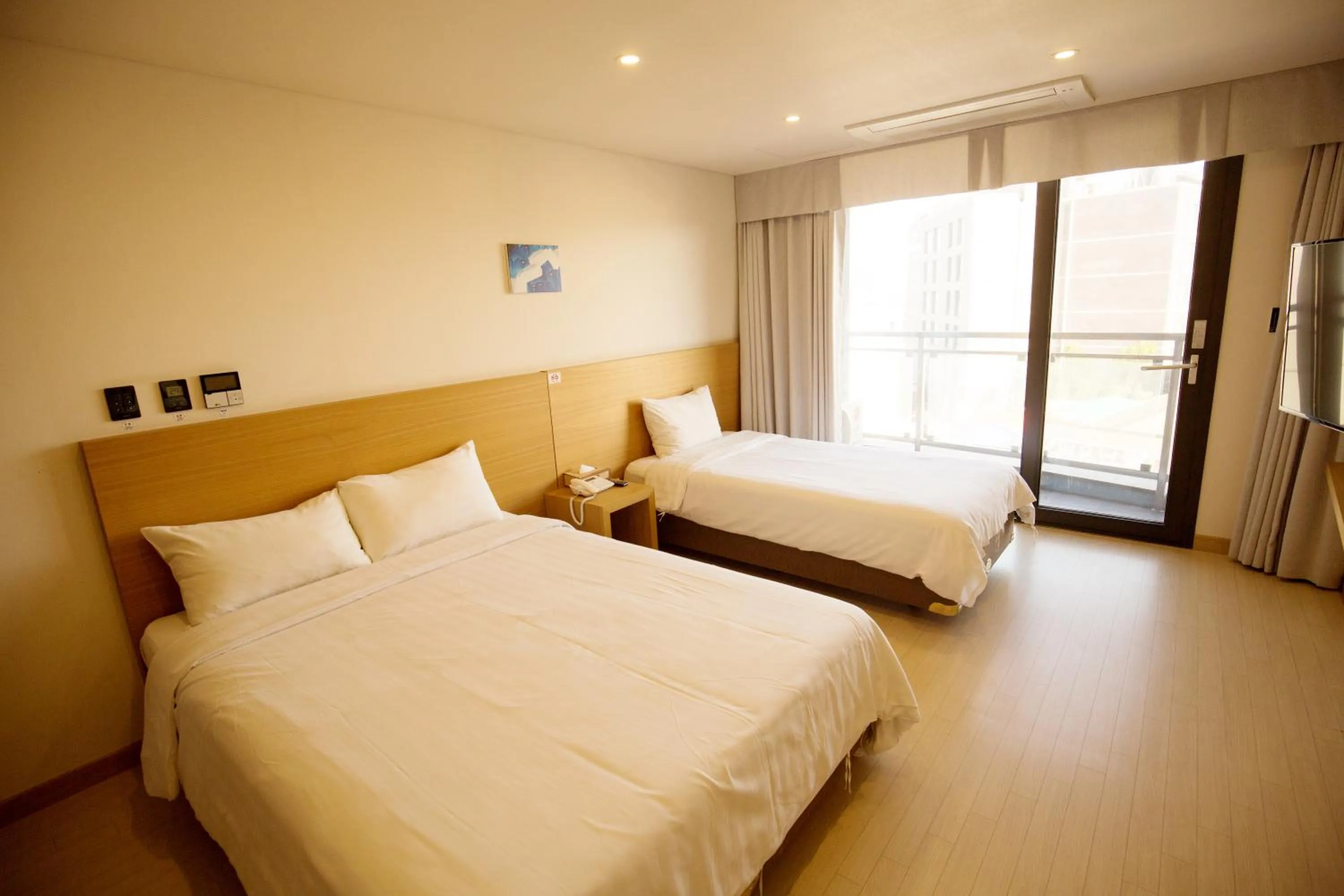 Bed in BK Hotel Jeju