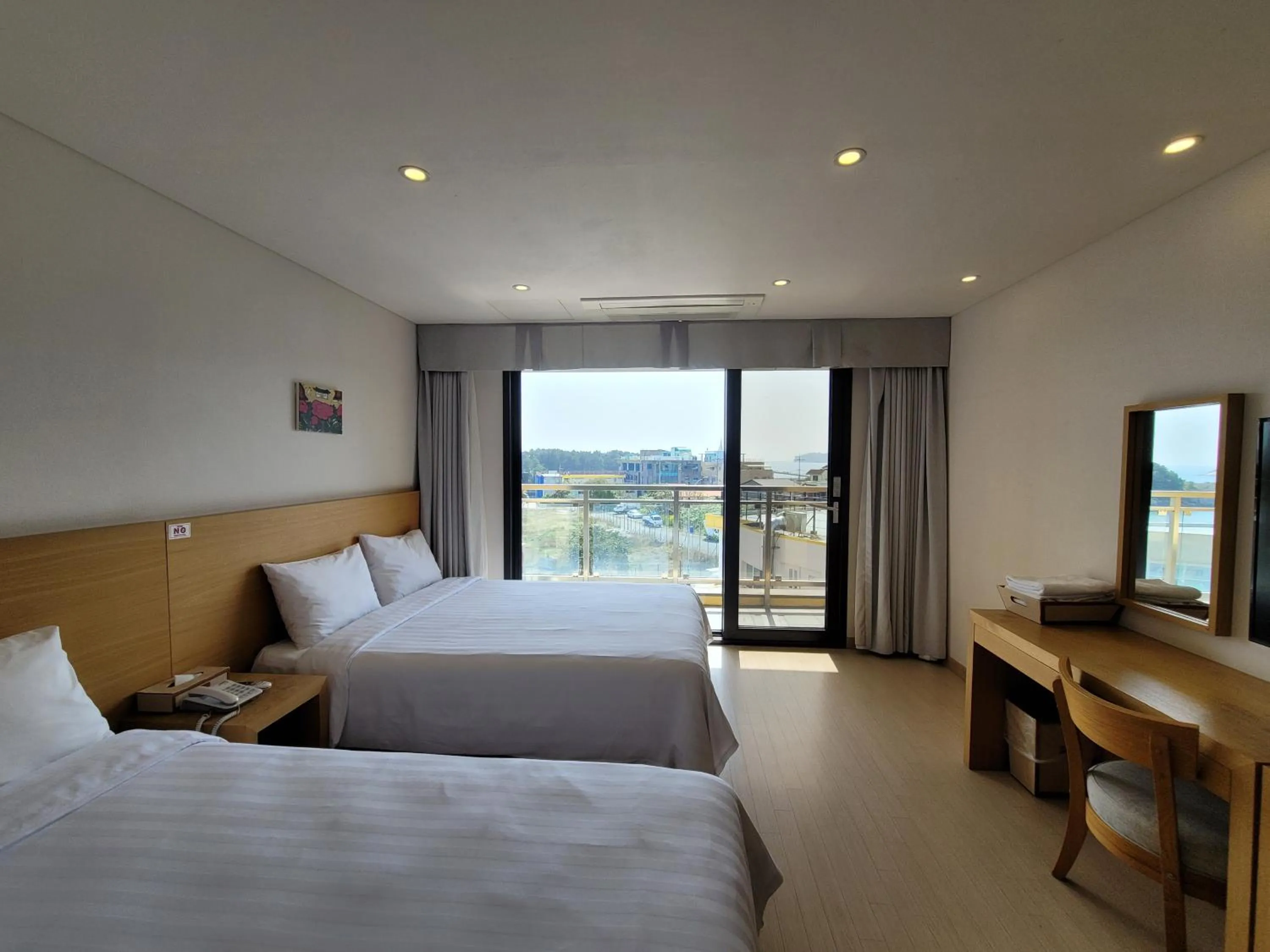 Photo of the whole room, Bed in BK Hotel Jeju