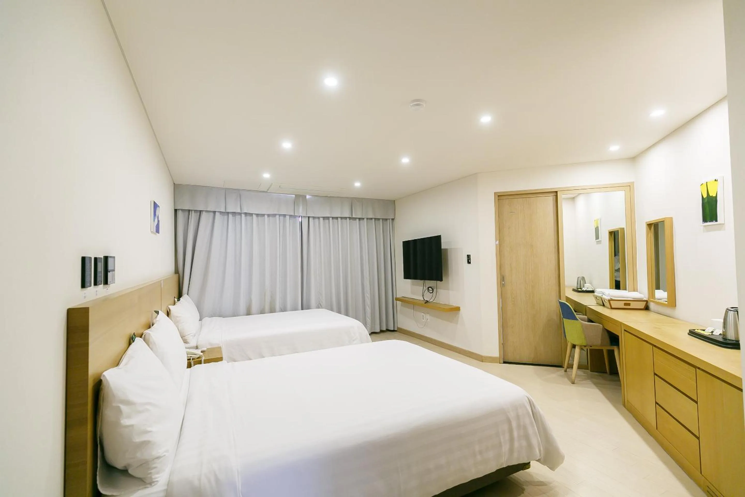 Photo of the whole room, Bed in BK Hotel Jeju