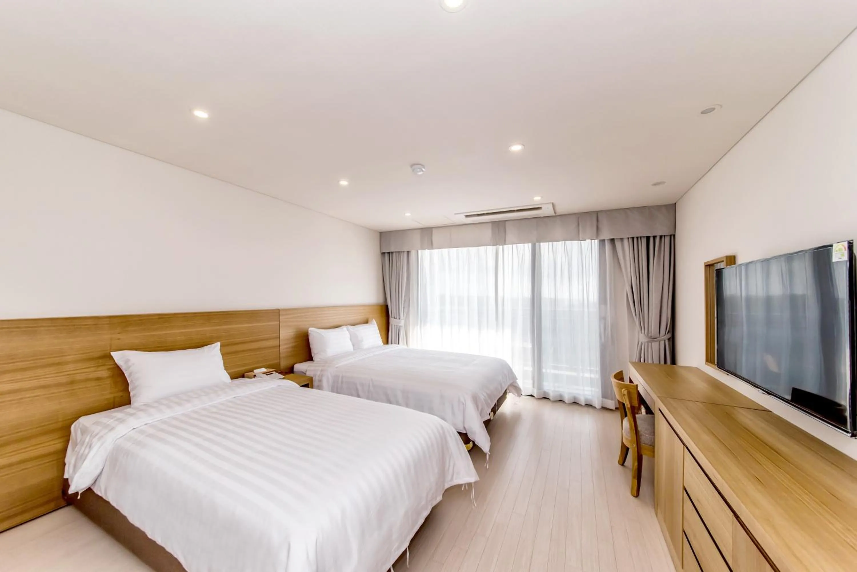 Bed in BK Hotel Jeju