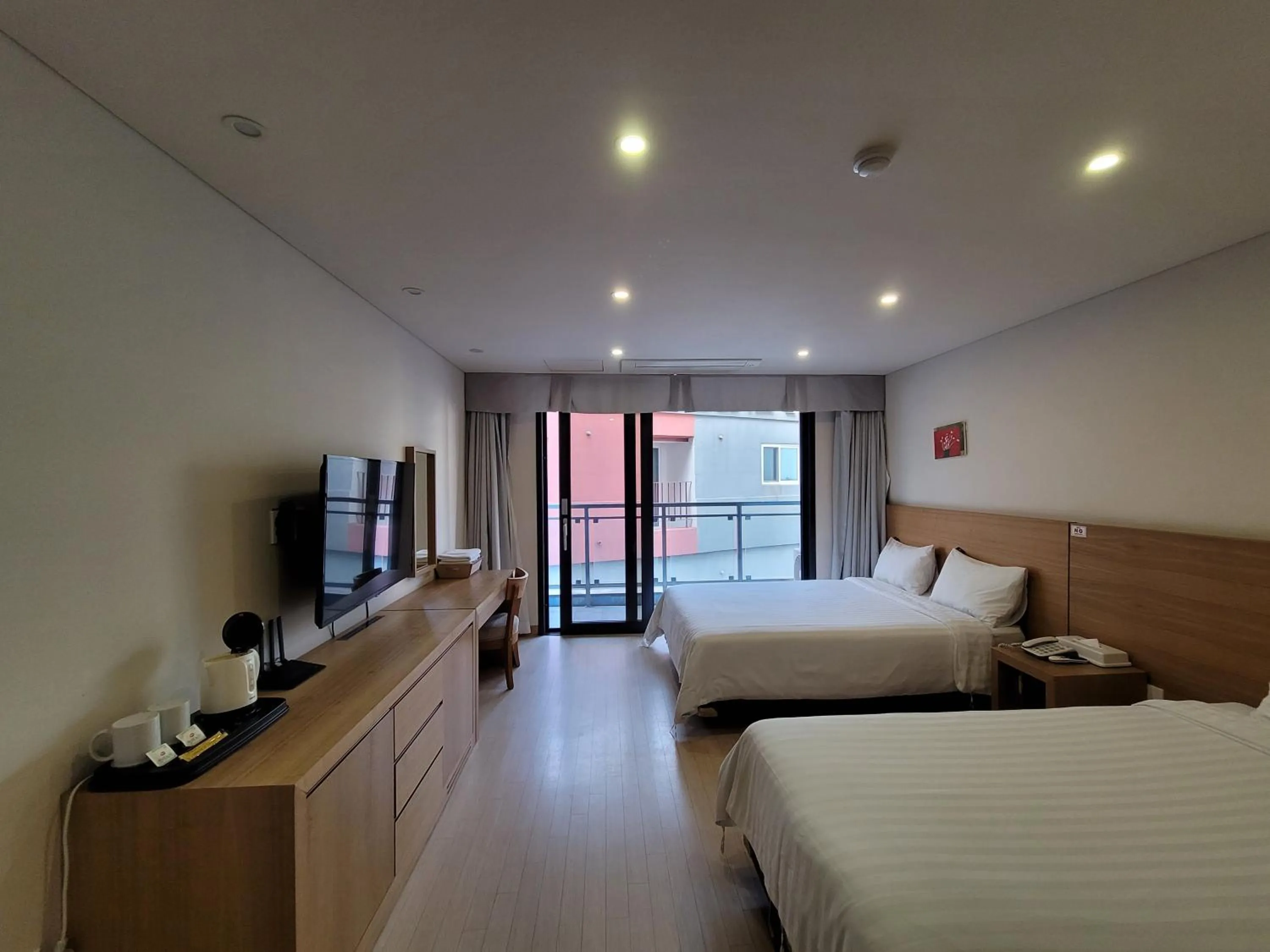 Photo of the whole room, Bed in BK Hotel Jeju
