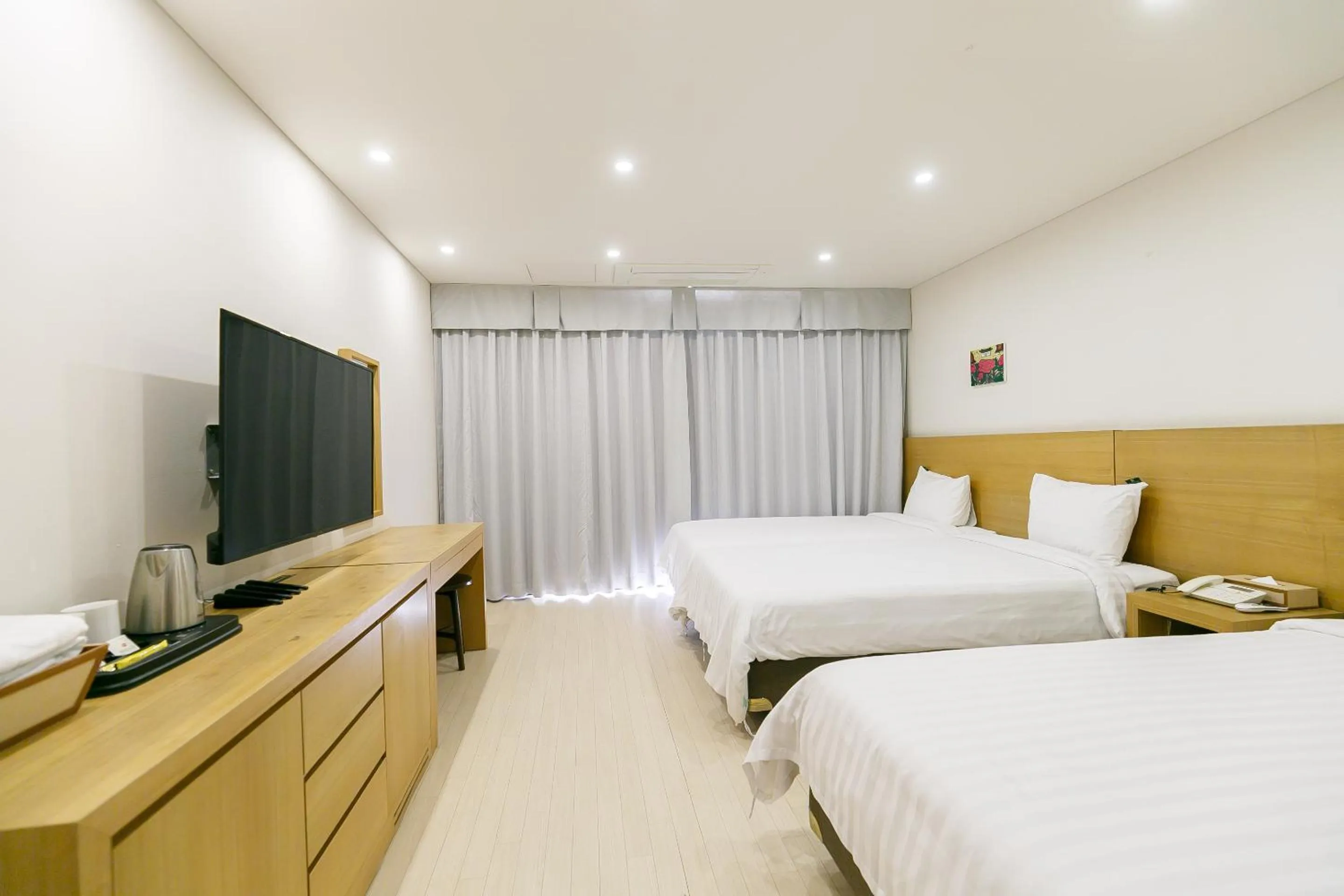 Photo of the whole room, Bed in BK Hotel Jeju