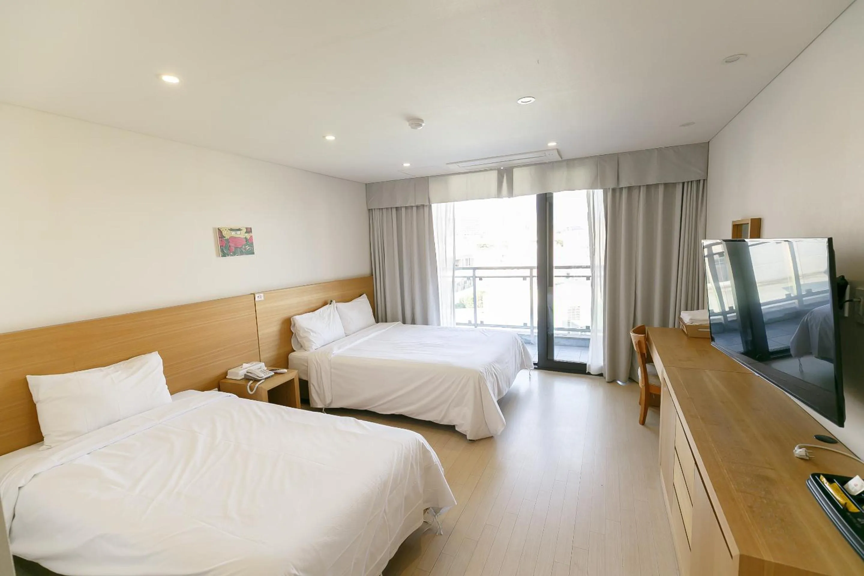 Photo of the whole room, Bed in BK Hotel Jeju