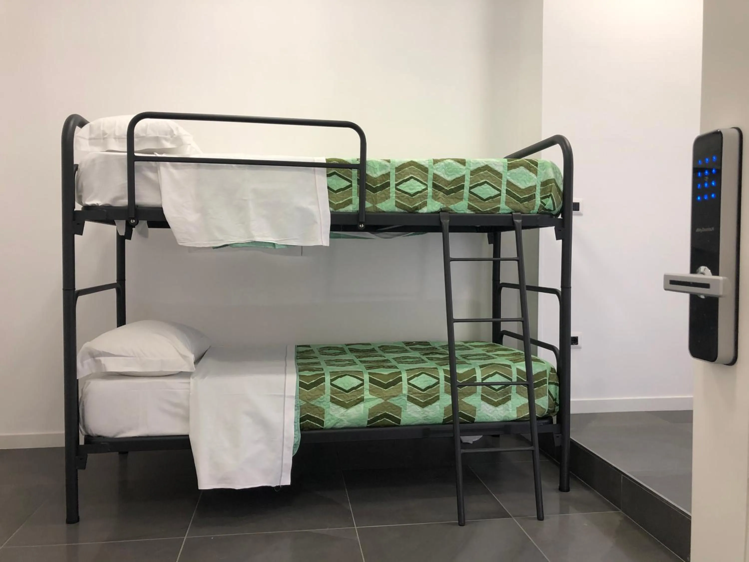 bunk bed, Bed in Top Floor Rentrooms Napoli