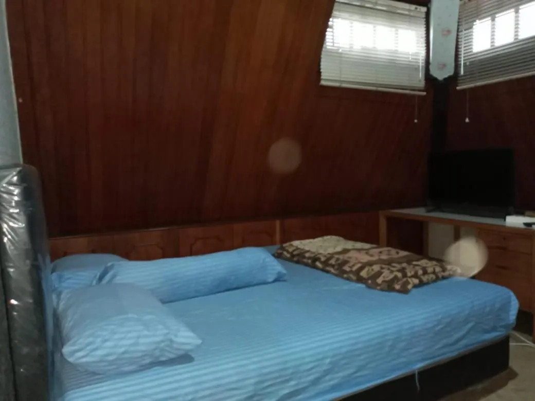 Bed in Mayestik Guest House Syariah
