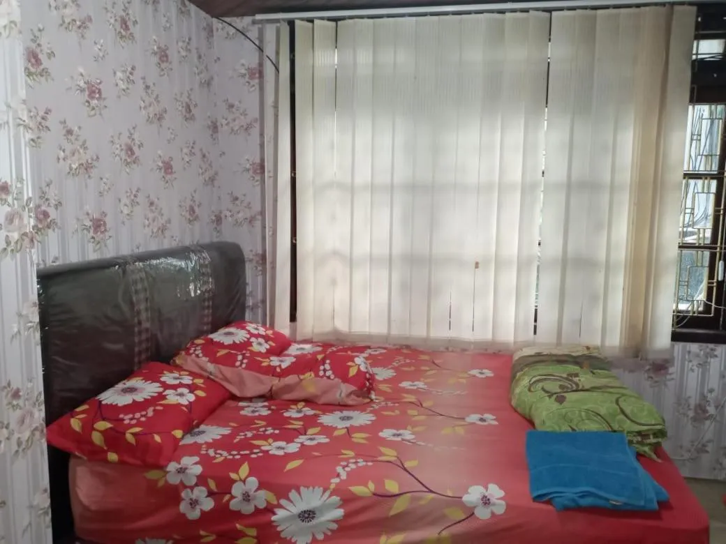 Bed in Mayestik Guest House Syariah