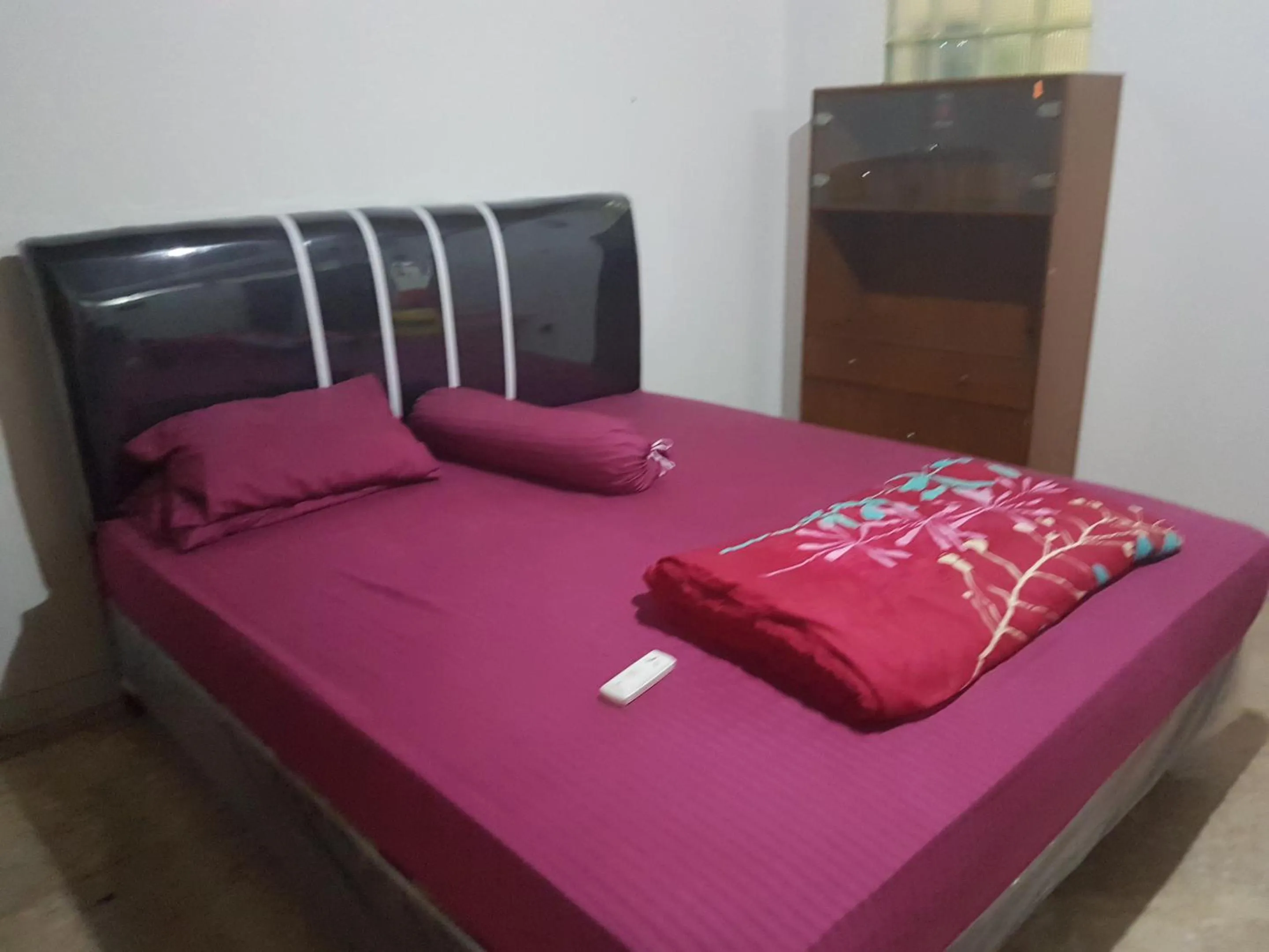 Bed in Mayestik Guest House Syariah