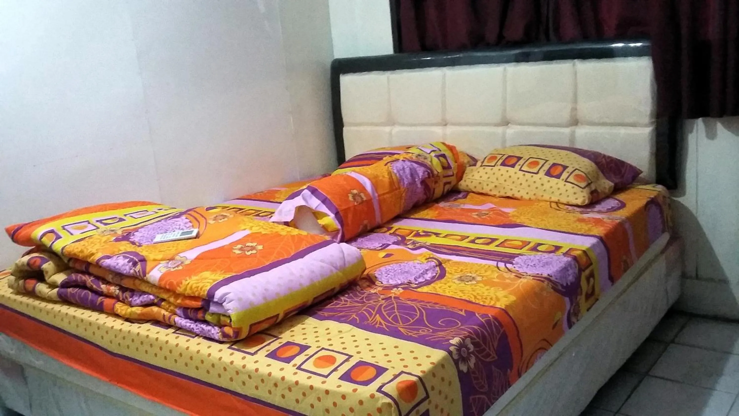 Bed in Mayestik Guest House Syariah