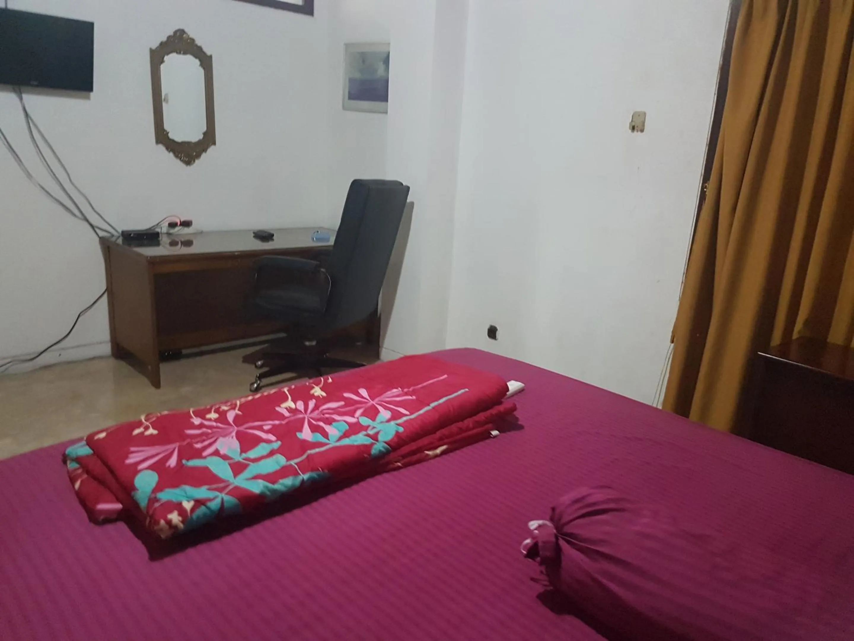 Bed in Mayestik Guest House Syariah