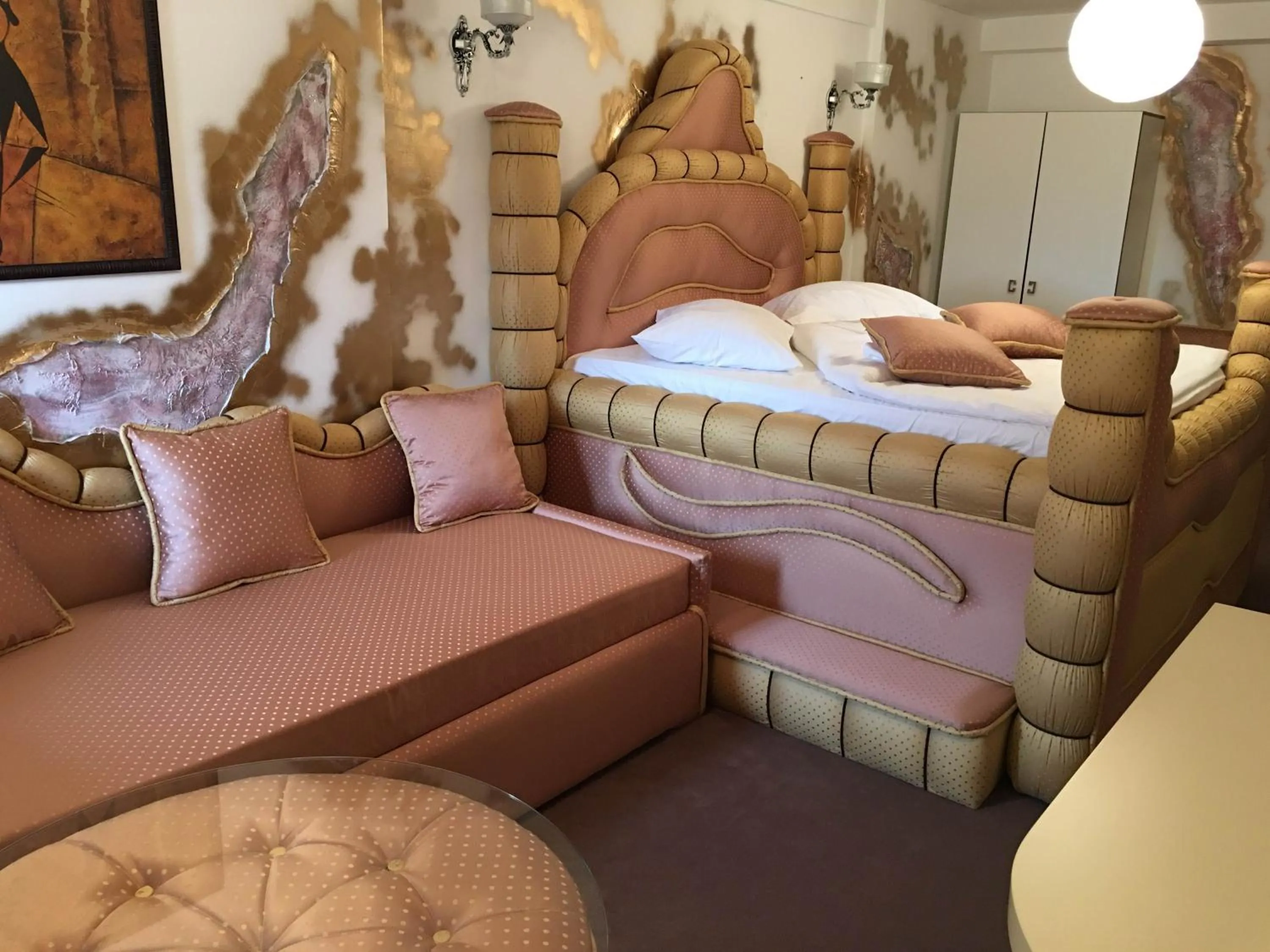 Bed in Bali Colosseum Hotel