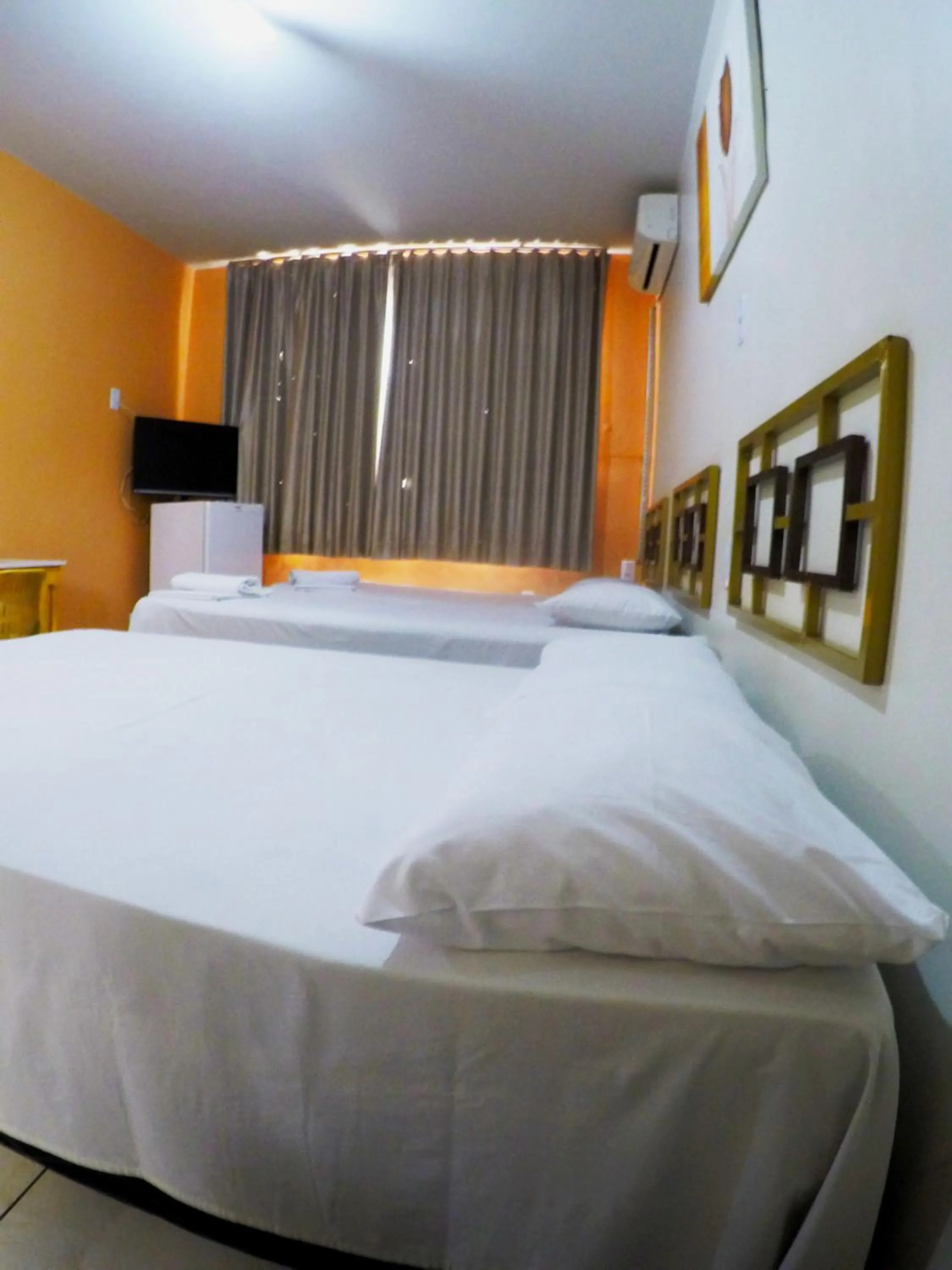 Bed in Hotel Itaipu