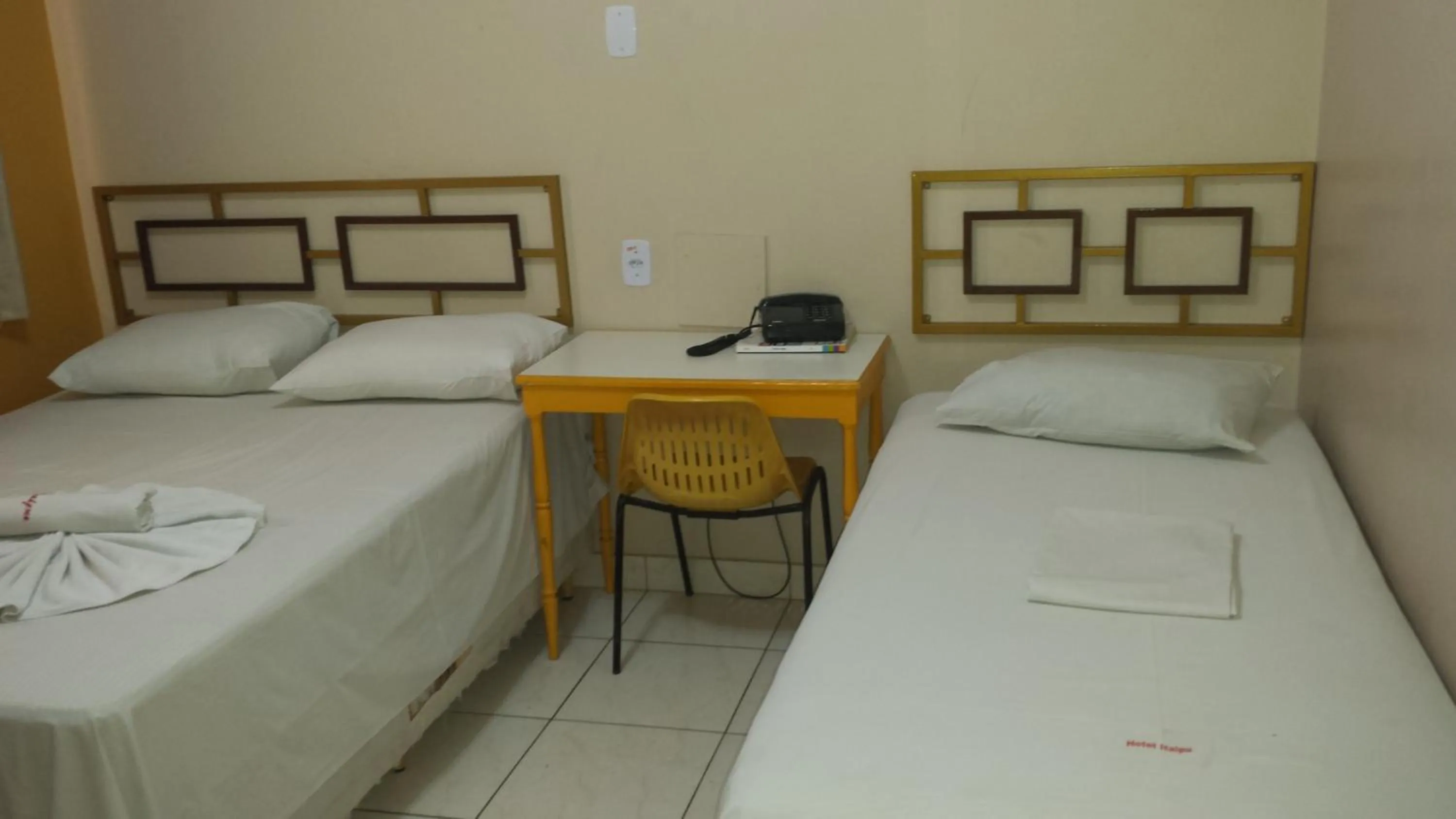 Bed in Hotel Itaipu