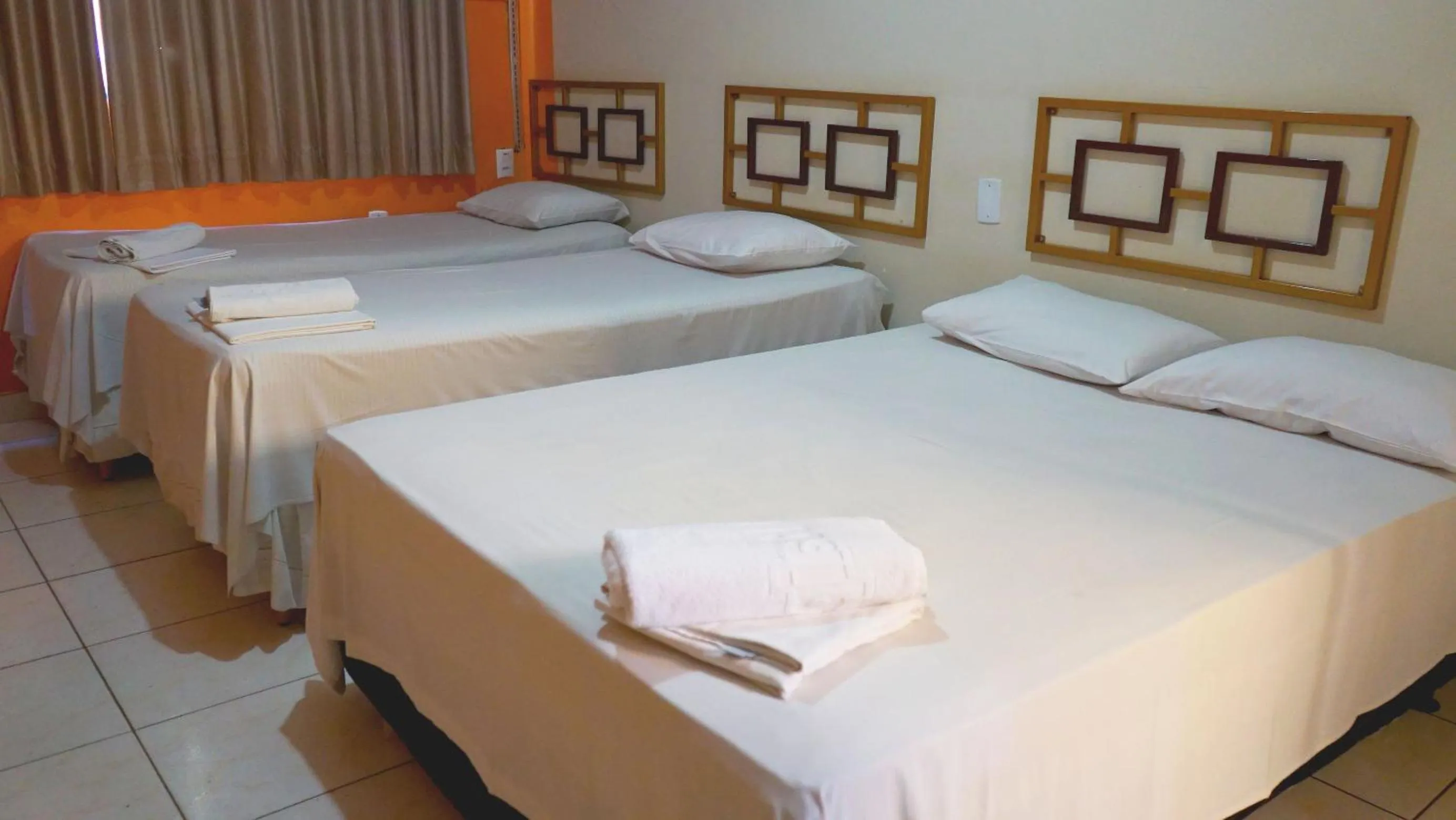 Bed in Hotel Itaipu