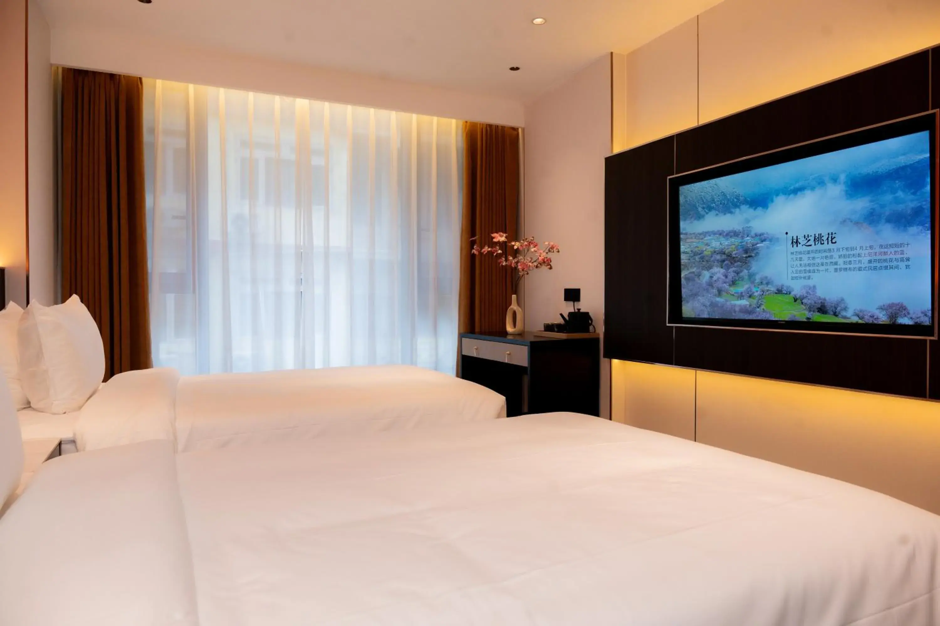 Deluxe Twin Room in Jiuding Joy Hotel Deluxe Twin Room in Jiuding Joy Hotel