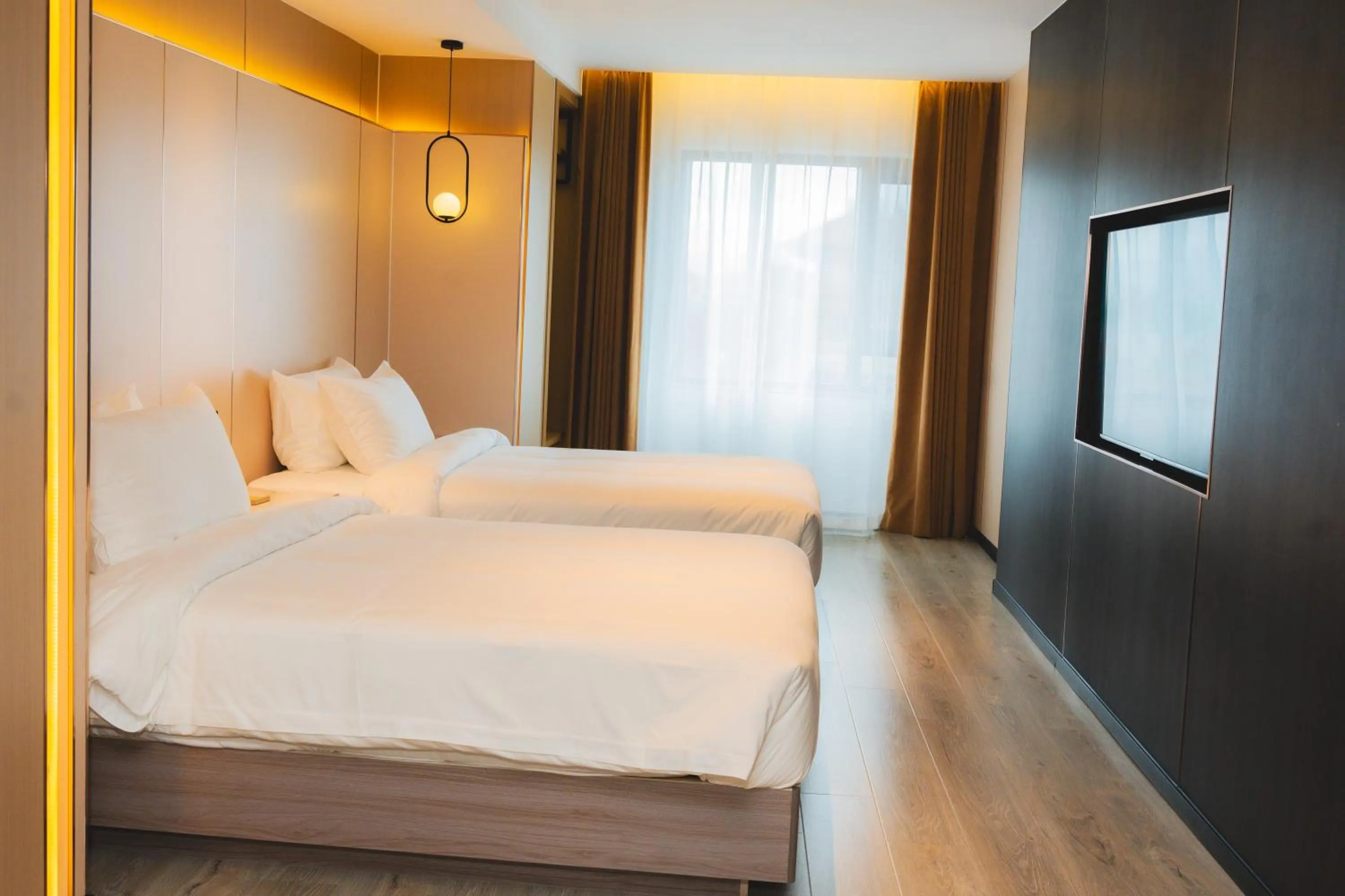 Bed in Jiuding Joy Hotel