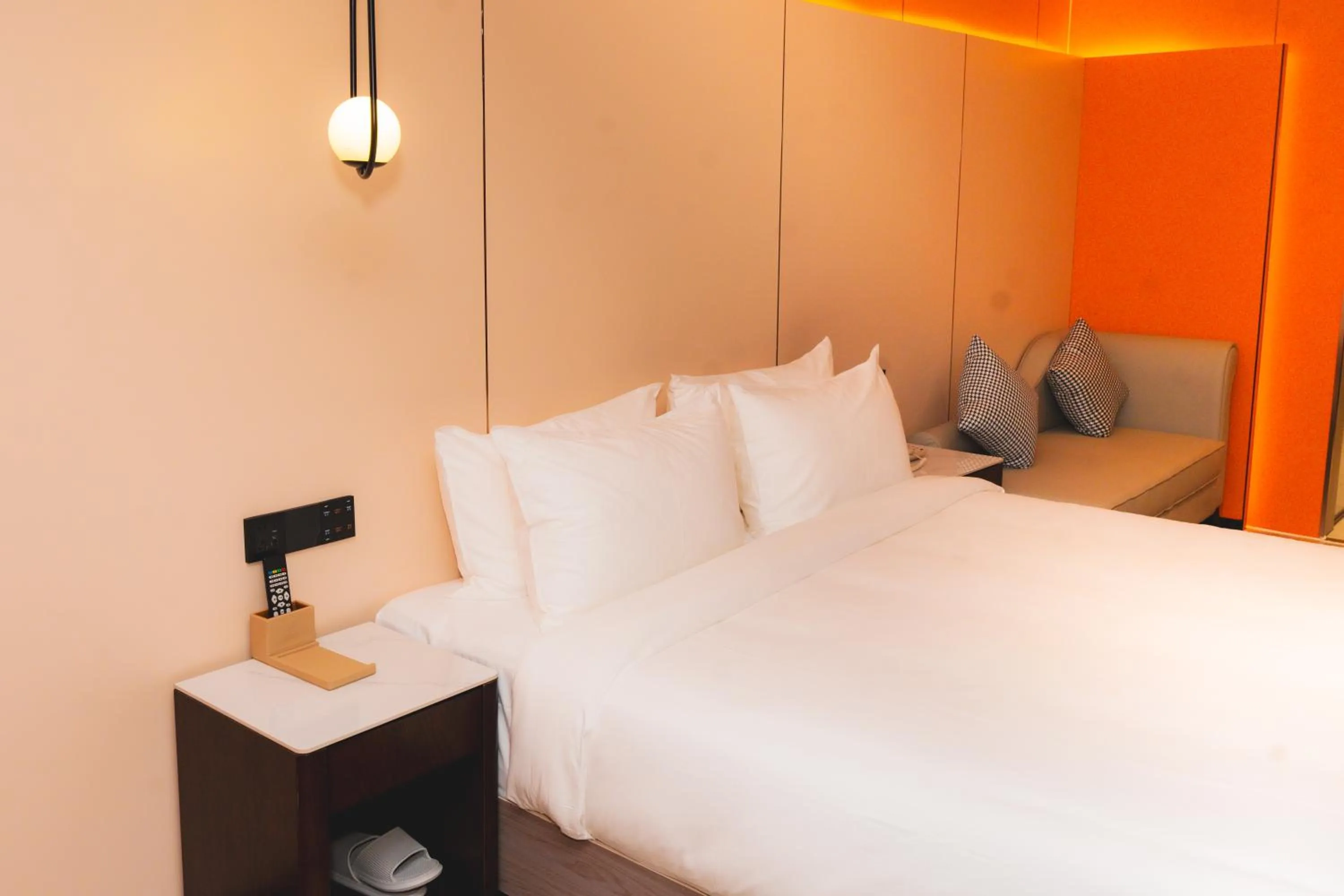 Bed in Jiuding Joy Hotel